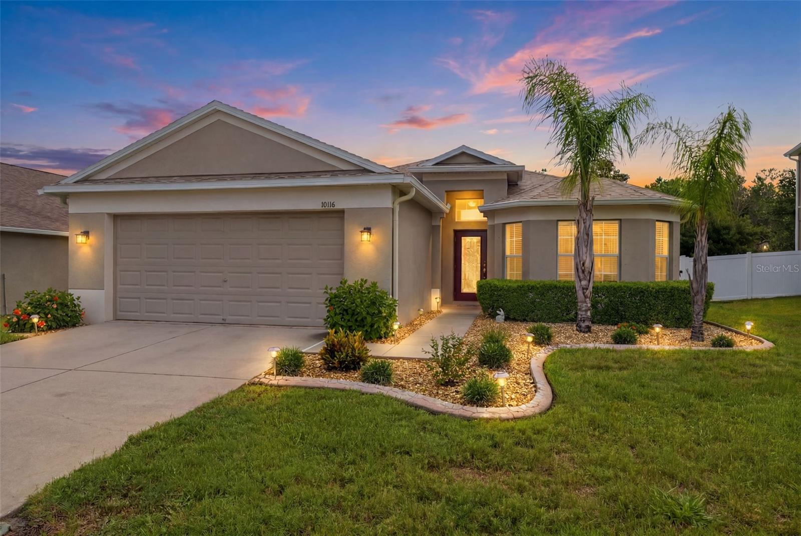 Beautiful and affordable! This 3-bedroom, 2 bath, OVERSIZED 2 car garage is move in ready!  NEW ROOF and water softener! Located in the popular and well-maintained community of Briar Oaks. LOW monthly HOA fees of $75.00! NO flood insurance required! Great curb appeal! So much quality of care is shown throughout the 1,720 heated sq footage. The total living sq footage is over 2,300. Gorgeous VAULTED ceilings!  Inside laundry room and additional closet space! The open floorplan allows the kitchen and great room to flow nicely together with a large granite island and (bay window) breakfast nook making it perfect for entertaining and accommodating large gatherings. The kitchen also has 42-inch cabinetry, newer stainless-steel appliances, reverse osmosis, large pantry and additional granite counter space. Neutral flooring and colors throughout! All bedrooms are spacious! The primary bedroom has a true en-suite with dual sinks and a tiled walk-in shower. Guest bath is shared conveniently between the additional bedrooms with granite vanity and tub. There are sliders leading from the great room out to the screened lanai (under truss) and completely fenced rear yard for private relaxation. No front or rear neighbors! Walking distance to the community park! Just minutes from some of Florida's most popular parks, beaches and so much more! Look no further and call for your private showing today!