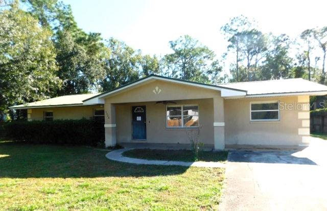 Large home with much Potential! Investor Opportunity. 3 bedroom, 2 bath with a living room and family room, and a bonus room. Block home with shaded yard. Ideal location right off Highway 27, YMCA, golf courses, state park and more! Don't miss out on this incredible opportunity. Buyer is advised to have complete and thorough inspections done and to verify all information. Seller/Agents have no knowledge of property conditions. Keys are not released until proof of funding and all buyer/seller documents have been delivered to Title Company. Being Sold As-Is.