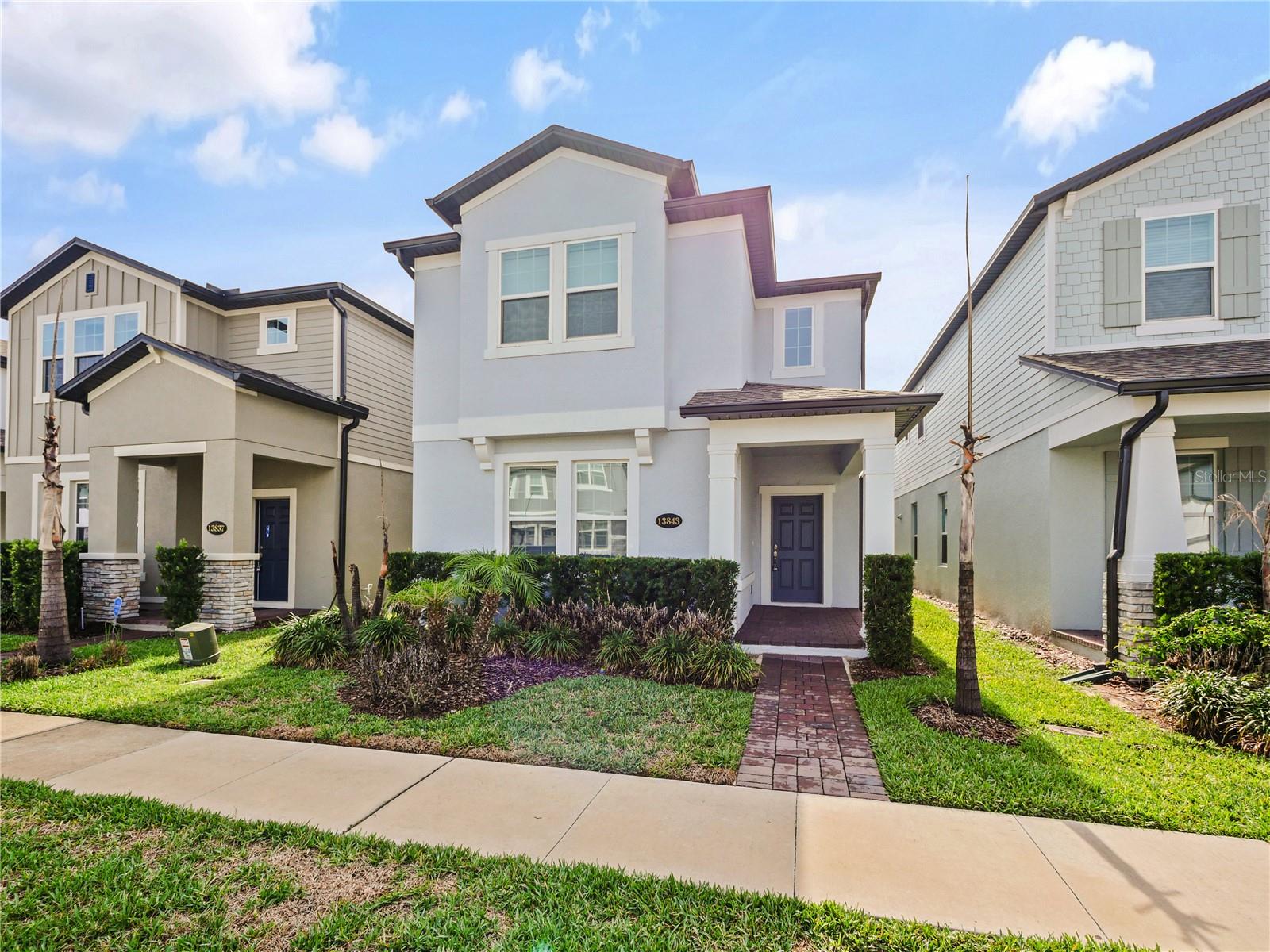 Beautiful home come with 4 bedrooms, 3½ baths, and a detached alley-loaded 2-car garage. Enjoy the wide-open space of this Horizon West new home, where the family room and kitchen flow harmoniously. The sizable family room offers plenty of natural light with lots of windows. The kitchen features a large island with overhang for seating, the perfect spot for prepping dinner and for meals on the go. The large walk-in pantry has plenty of space to help keep you stocked up. stainless steel appliance package that includes a natural gas slide-in range. The dining room, with a large window allowing natural light to stream in, offers convenient access to the kitchen. A powder bath, along with a linen closet, complete the downstairs, while a single French door leads you to the covered lanai and access to the detached garage. Upstairs, the 2 secondary bedrooms, the destination laundry room with a deep tub, a hall bath with a second sink, open are at the second floor. tow Walkin closet located privately in the front of the home is the owner’s suite, with a tray ceiling. The owner’s bath showcases separate vanities, a large shower. Disney Animal Kingdom is 7-minutes away 5 minutes to shopping area.