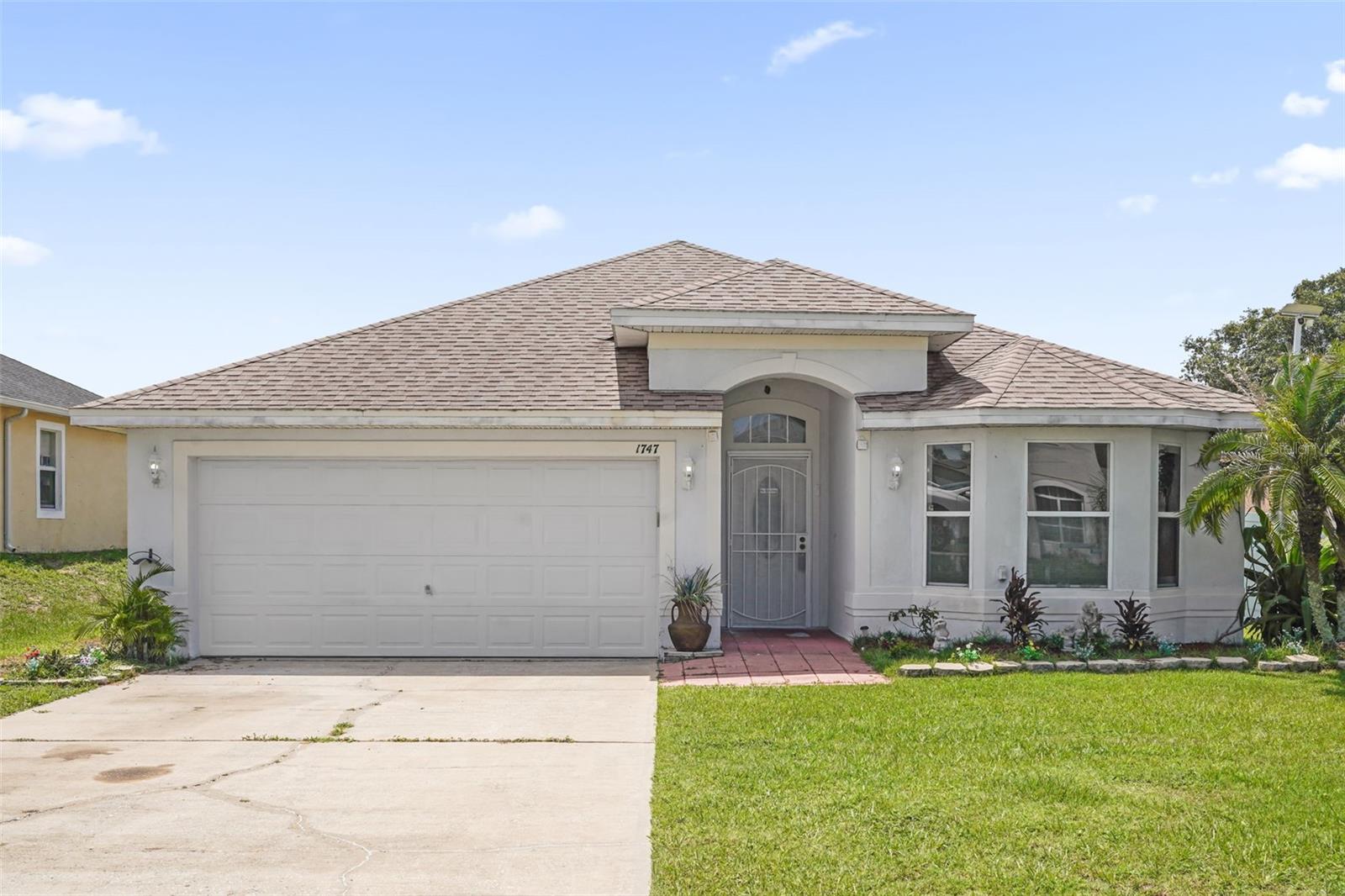 Move-In Ready Home for Sale in Poinciana, FL 34759 – Ideal for First-Time Buyers! Welcome to this beautifully maintained 3-bedroom, 2-bath home in Poinciana, offering 1633 sq ft of living area with a functional layout perfect for first-time buyers or growing households. This home has been lovingly cared for and is truly move-in ready, with major updates already completed. Completely painted interior 7/2026. Inside, you’ll find formal living room, and a large eat-in kitchen featuring a breakfast bar and closet pantry, ideal for everyday living and entertaining. The split-bedroom floor plan provides added privacy, while the indoor laundry room adds convenience. The primary bedroom suite includes a walk-in closet, dual sinks, and a relaxing garden tub, creating a comfortable retreat after a long day. Spacious back screened porch overlooking your beautiful back yard garden. Great for enjoying your morning coffee. Best of all, this home offers big-ticket upgrades first-time buyers love—a brand-new AC installed 2022, water heater 2022, vinyl fenced back yard 2022, garage door opener 2022, whole house water softener 2025, reverse osmosis water filter in kitchen 2025 and a new roof 2016 helping reduce future maintenance costs Located in a popular Poinciana community, residents enjoy access to parks, playgrounds, tennis courts, racquetball courts, and a nearby soccer field. Close to shopping, dining, schools, and major roadways, this home offers both comfort and convenience. Don't leave this one off your list.
