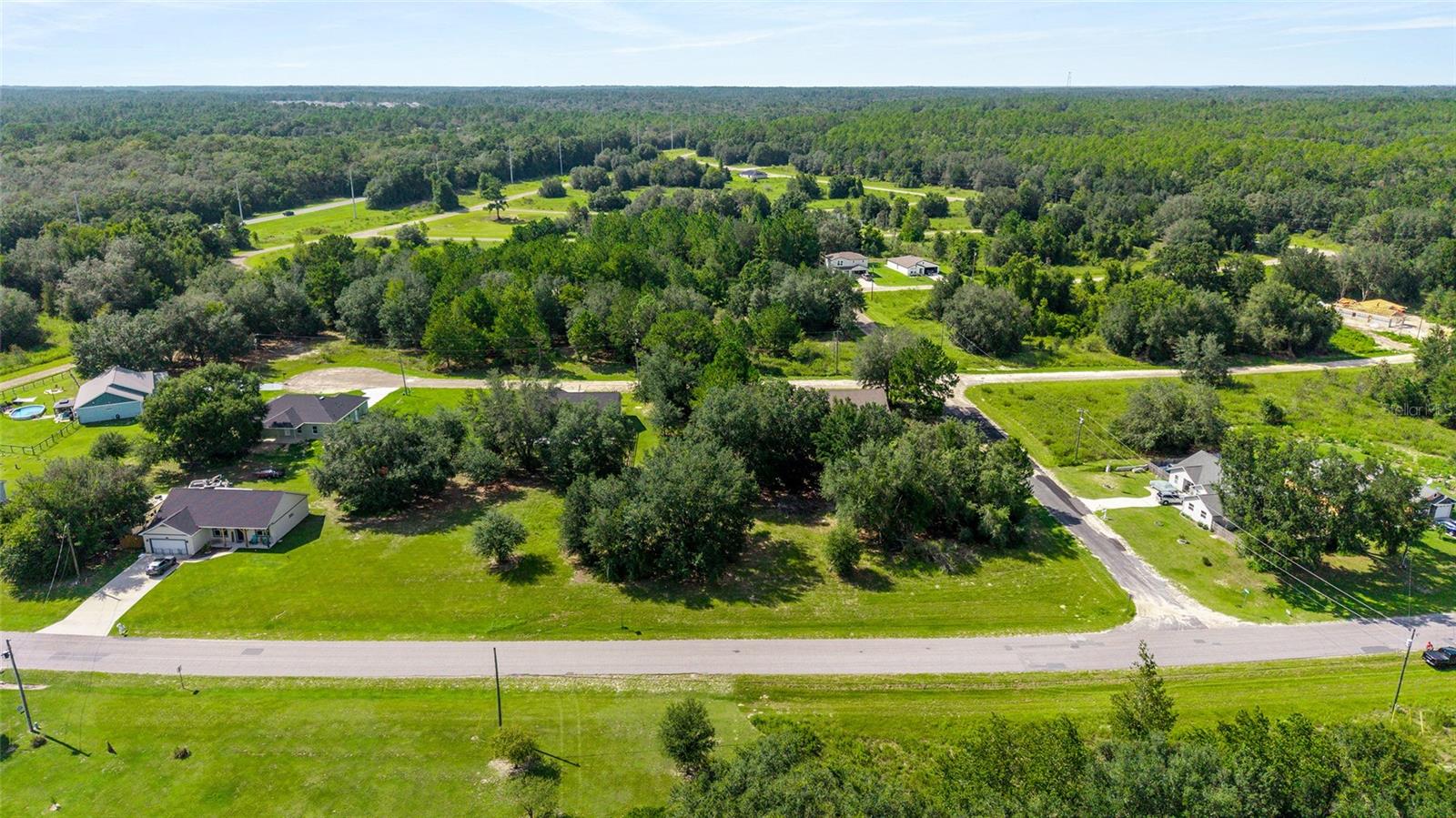 Two adjacent, buildable parcels being sold together. Both have excellent elevation and have been partially cleared leaving a few feature trees. High & Dry!!! Citrus Springs is Deed Restricted to protect your investment, but NO HOA and NO HOA FEES. These two parcels are located on a paved road in an area with new construction homes. The Citrus Springs community is a short 10 min drive to Dunnellon and the sparkling Rainbow River for kayaking, snorkeling, swimming, tubing, fishing and much more. Plus you'll enjoy being only 3 blocks away from a trailhead for the 46-mile-long Withlacoochee State Trail - one of Florida's longest paved "rails to trails"! A third, adjacent, corner parcel, located to the east is also available for purchase: OM709560.