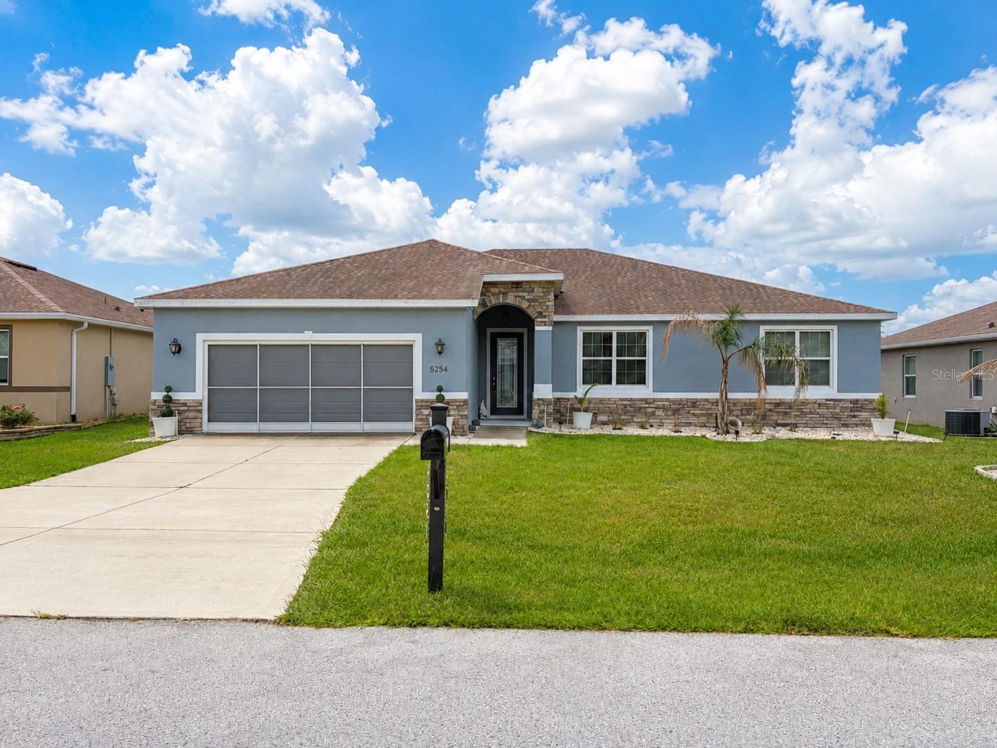 Welcome to this impeccably maintained home located in the sought-after Summercrest community! This spacious 4-bedroom, 2-bath residence offers 2,226 square feet of living space and a desirable split-bedroom floor
plan designed for comfort and privacy. The main living areas feature attractive 18" x 18" tile flooring, while plush carpeting adds warmth and comfort to the bedrooms.
The well-appointed kitchen features beautiful wood cabinetry, stone countertops, a convenient breakfast bar, and appliances that were primarily replaced in 2025. The spacious dining area flows seamlessly into an
impressive 29' x 11' screened and covered lanai—perfect for relaxing, entertaining, or enjoying Florida's beautiful weather. The inviting living room also provides direct access to the lanai through triple sliding glass doors,
creating a wonderful indoor-outdoor living experience. Step outside to the vinyl-fenced backyard, offering plenty of space to create your own private oasis and even add a swimming pool. Energy efficiency is a major
highlight of this home, featuring a 36-panel solar system that helps reduce the average monthly electric bill to approximately $30. Best of all, the solar system will be PAID IN FULL and will convey to the new owner at
closing! Additional features include an A/C system replaced in 2025 with a smart thermostat, an indoor laundry room with additional cabinetry for storage, a two-car garage with a privacy screen, an automatic irrigation
system, and an ADT three-camera security monitoring system. Packed with upgrades, energy-efficient features, and exceptional indoor and outdoor living space, this home is PRICED TO SELL! Schedule your private
showing today and come see everything this beautiful home has to offer!