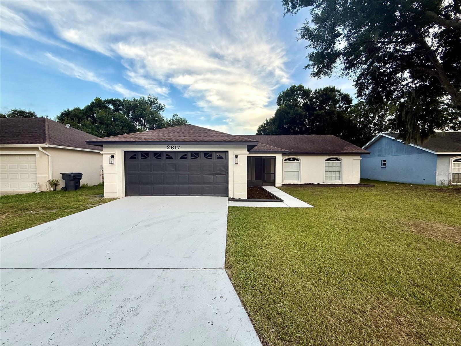 Welcome to 2617 Sundance Circle, Mulberry, FL—a beautifully renovated 4-bedroom, 2-bathroom home that perfectly blends modern design with everyday comfort. From the moment you step inside, you’ll appreciate the open-concept floor plan, thoughtfully designed to create a bright, spacious atmosphere that’s perfect for both entertaining and daily living.
This move-in-ready home features custom finishes throughout, including stylish fixtures, updated flooring, and a beautifully remodeled kitchen and living space. The expansive primary suite offers a private retreat with a generous bedroom and a stunning ensuite bathroom designed with comfort and luxury in mind.
Additional highlights include a two-car garage, a fully fenced backyard ideal for pets, play, or outdoor gatherings, and tasteful upgrades throughout the entire home.
Nestled in the welcoming community of Mulberry, you’ll enjoy the charm of a quieter lifestyle while remaining just minutes from Lakeland’s shopping, dining, and entertainment. With convenient access to major highways, commuting to Tampa, Orlando, and world-famous attractions like Walt Disney World is a breeze, making this location the perfect balance of peaceful living and accessibility.
Don’t miss your opportunity to own this beautifully updated home—schedule your private showing today!