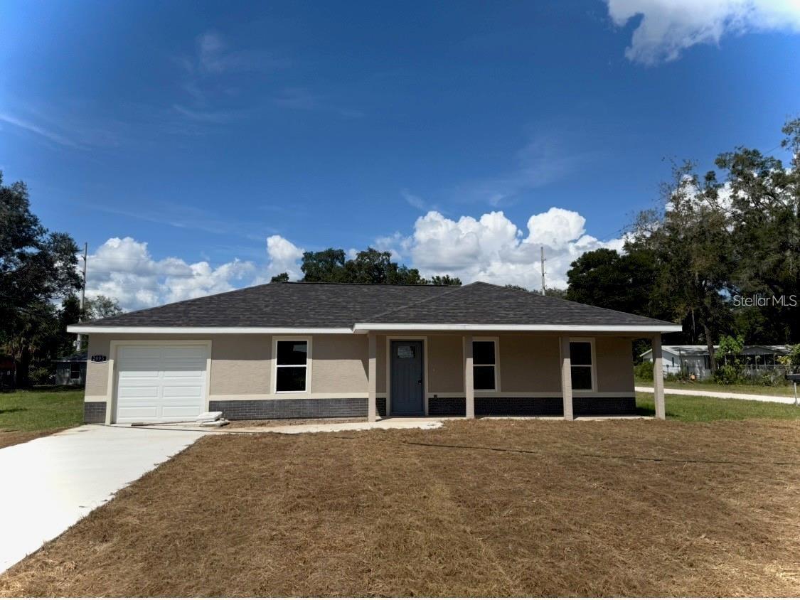Under Construction. Brand New 3/2 home with 1 car garage conveniently located in growing area of Summerfield. Easy access to I75, Ocala, Belleview and The Villages. Enjoy the open concept floor plan with ceramic tile flooring throughout. Kitchen & baths have granite counter tops and upgraded cabinets. Stainless steel appliances including Range, Refrigerator, Dishwasher and Microwave. Inside Laundry Room. Remote garage door opener. PHOTOS ARE OF A DESTINY MODEL THAT WAS PREVIOUSLY BUILT AND NOT OF THE ACTUAL LISTING.