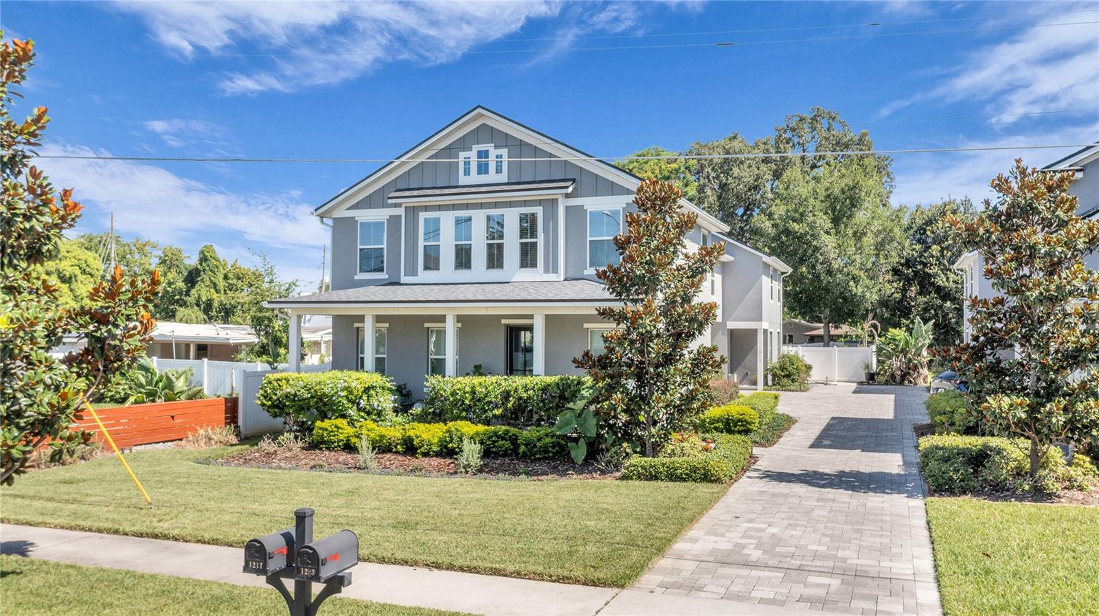 Welcome to this beautifully maintained front-unit townhome in the heart of the highly desirable SODO/Wadeview Park neighborhood! Built in 2021, this 3-bedroom, 2.5-bath home offers the perfect blend of modern design, low-maintenance living, and the privacy of a single-family home—all with NO HOA. From the inviting front porch to the attached two-car garage, this home makes a wonderful first impression. Inside, you'll find a bright, open-concept floor plan filled with natural light and enhanced by durable luxury vinyl flooring throughout the main living areas. The stunning kitchen is the centerpiece of the home, featuring quartz countertops, stainless steel appliances, a large center island with bar seating, and a spacious walk-in pantry. The adjoining living and dining areas create an ideal space for everyday living and entertaining, while a convenient downstairs half bathroom is perfect for guests. Sliding glass doors open to a private patio, creating the perfect space for morning coffee, outdoor dining, or entertaining friends and family. Upstairs, the spacious primary suite provides a relaxing retreat with a large walk-in closet and a beautifully appointed en suite bathroom complete with dual vanities and a glass-enclosed shower. Two additional bedrooms, a full guest bathroom, and a generously sized laundry room offer comfort and convenience for everyday living. A versatile loft area at the top of the stairs is ideal for a home office, study space, reading nook, or fitness area. Perfectly positioned in one of Orlando's most sought-after neighborhoods, you'll enjoy being just minutes from Downtown Orlando, SODO, Delaney Park, Thornton Park, the Hourglass District, the Milk District, Orlando Health, and the Dr. Phillips Center for the Performing Arts. Walk to Publix, Target, Wadeview Park, and top-rated Blankner K-8 and Boone High School, making this an exceptional location for convenience and lifestyle alike. Designated as a townhome but truly living like a single-family residence, this move-in-ready home offers modern construction, an unbeatable location, and no homeowners association fees. With quick access to I-4, SR 408, premier shopping, dining, parks, and entertainment, this is a rare opportunity to own a newer home in one of Orlando's most desirable neighborhoods. Welcome home!