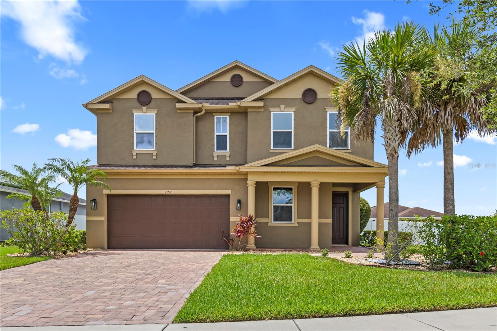 POOL HOME • BRAND NEW LVP FLOORING • CORNER LOT • GATED COMMUNITY • FENCED YARD • SOLAR PANELS • WATER SOFTENER SYSTEM • FRESHLY PAINTED. Welcome to this beautifully updated pool home located on a desirable corner lot in the gated community of The Villages of Trinity Lakes. Ideally situated in the heart of Trinity, you'll enjoy quick access to shopping, restaurants, parks, top-rated schools, and everyday conveniences. From the moment you arrive, you'll appreciate the fresh landscaping and inviting curb appeal. Inside, the home features fresh interior paint, brand-new luxury vinyl plank flooring throughout the living areas and bedrooms, durable tile in the wet areas, and absolutely no carpet. A welcoming sitting area and convenient half bath greet guests before opening to the spacious main living area. The open-concept kitchen is designed for both everyday living and entertaining, featuring double wall ovens, a spacious refrigerator, abundant cabinetry, and seamless views into the living room and backyard oasis. Step outside to your private retreat complete with a sparkling pool, relaxing waterfall features, a brick paver deck, and a fully fenced backyard—perfect for entertaining, family gatherings, or simply enjoying Florida living. Upstairs, you'll find a spacious loft with a built-in brick entertainment center, creating the perfect second living space, media room, or game room. The private primary suite is thoughtfully separated from the additional bedrooms and overlooks the pool. The ensuite bathroom features dual vanities, a large walk-in closet, and plenty of space to unwind. The additional bedrooms are generously sized and filled with natural light, while the upstairs laundry room and multiple storage closets—including under-stair storage—provide exceptional functionality. This move-in-ready home also includes solar panels to help reduce electric costs, a whole-home water softener system, and a kitchen drinking water filtration system. With its extensive updates, exceptional outdoor living space, and unbeatable Trinity location, this home offers the perfect combination of comfort, efficiency, and lifestyle. Schedule your private showing today before this one is gone!