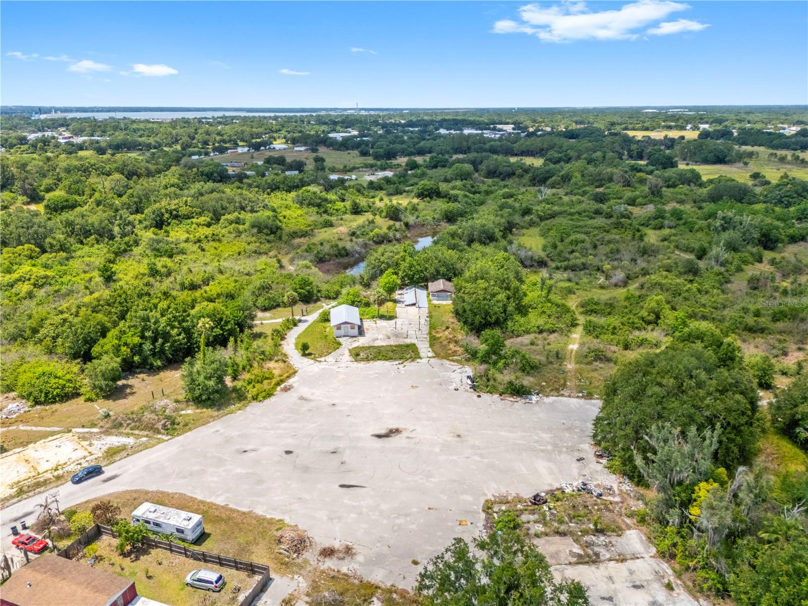 Rare Lakeland redevelopment opportunity situated on approximately 2.72 acres at 1100 Skyview Blvd, Building 1, Lakeland, FL. This property offers a strong blank canvas investment opportunity for builders, investors, developers, or owner-users looking for land with long-term upside in the growing Polk County market.

The existing buildings are in older, run-down condition, making the true value of this property the land, location, and future potential. With a reported Commercial General land use code and RS zoning, this site may offer flexibility for a buyer willing to explore redevelopment, renovation, adaptive reuse, or future commercial possibilities, subject to county/city approval.

Positioned in Lakeland, one of Central Florida’s growing markets, this 2.72-acre commercial land opportunity provides room for vision, repositioning, and value-add potential. Whether you are looking for a Polk County development opportunity, a future owner-user site, or a value-add real estate investment, this property gives you the canvas to create something new.