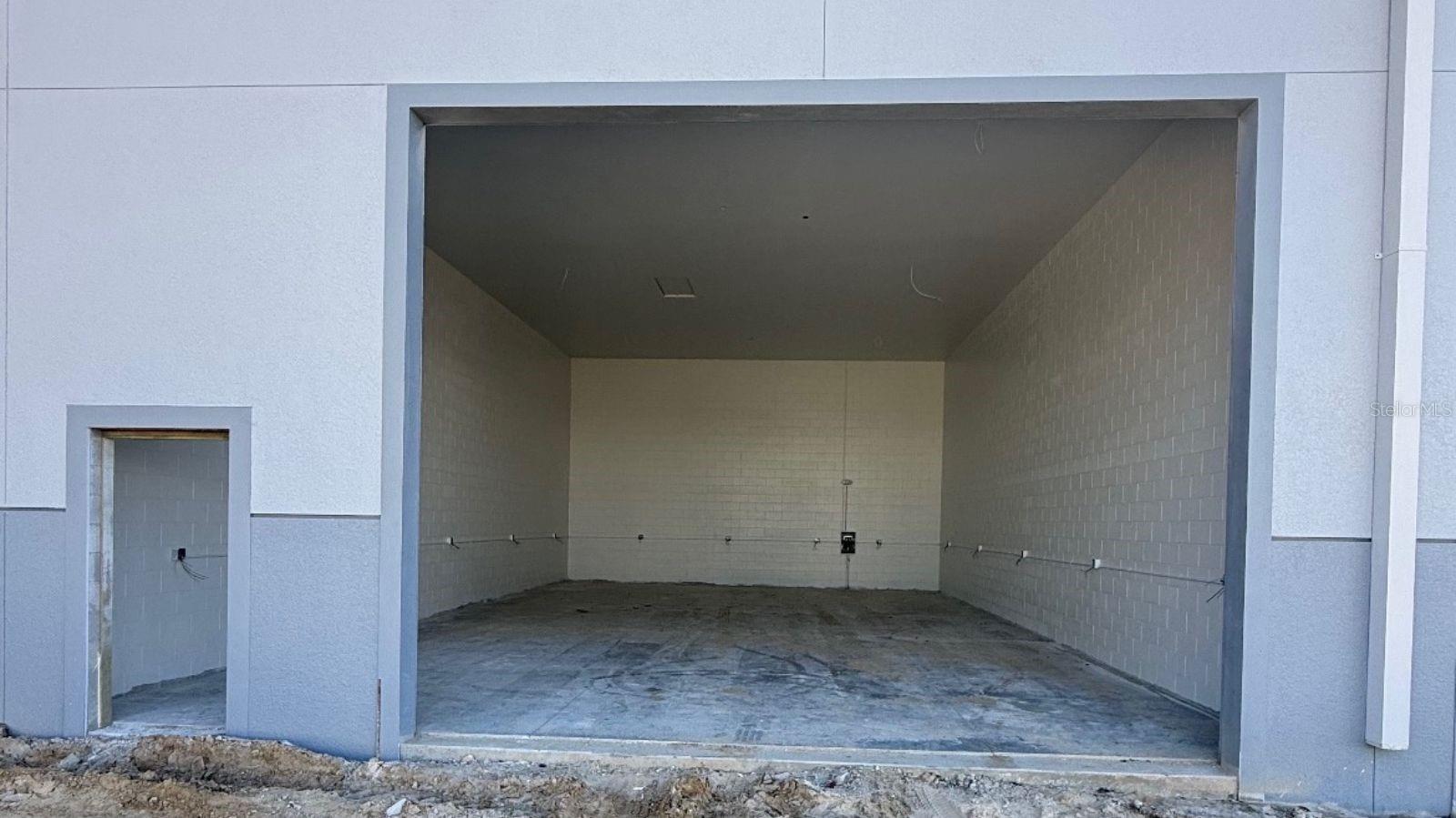 RARE PRE-CONSTRUCTION STORAGE CONDO OPPORTUNITY IN THE HEART OF PUNTA GORDA! Secure your unit now in one of Southwest Florida’s newest and most sought-after storage condominium developments. Conveniently located just minutes from downtown Punta Gorda, major highways, shopping, dining, and area marinas, this is a unique opportunity to own premium storage space in a HIGH & DRY location situated over 19 FEET ABOVE SEA LEVEL and OUTSIDE OF A FLOOD ZONE. Located at 5237 Taylor Rd, Garage E9, Punta Gorda, FL 33950, this spacious 30 FT x 52 FT unit offers approximately 1,560 square feet of versatile space, ideal for storing RVs, boats, classic cars, recreational vehicles, business inventory, equipment, or creating the ultimate workshop and hobby space. Built with durability, security, and long-term value in mind, the development features 100% masonry construction with solid concrete roofs, providing exceptional strength and protection. The generous 18-foot clear ceiling height offers outstanding vertical storage potential, while the oversized garage door allows for easy access to larger vehicles, trailers, and equipment. Additional features include: • HIGH & DRY LOCATION – 19+ feet above sea level • NO FLOOD ZONE • Gated entry and exit access • Individual climate-controlled options available • Bright LED lighting • Ceiling fans for improved airflow • Keyless entry systems • High-speed WiFi throughout the facility • 100 AMP electrical service • Multiple electrical outlets including 50 AMP RV capability • Security camera monitoring • Wide drive aisles designed for easy maneuvering • Low-maintenance ownership alternative to traditional warehouse space. Whether you're looking for a secure place to store your prized vehicles, a private workspace, additional business storage, or a unique investment opportunity in a rapidly growing area, this pre-construction storage condo offers exceptional flexibility and value. Reserve your unit today and take advantage of this limited opportunity before construction is complete.