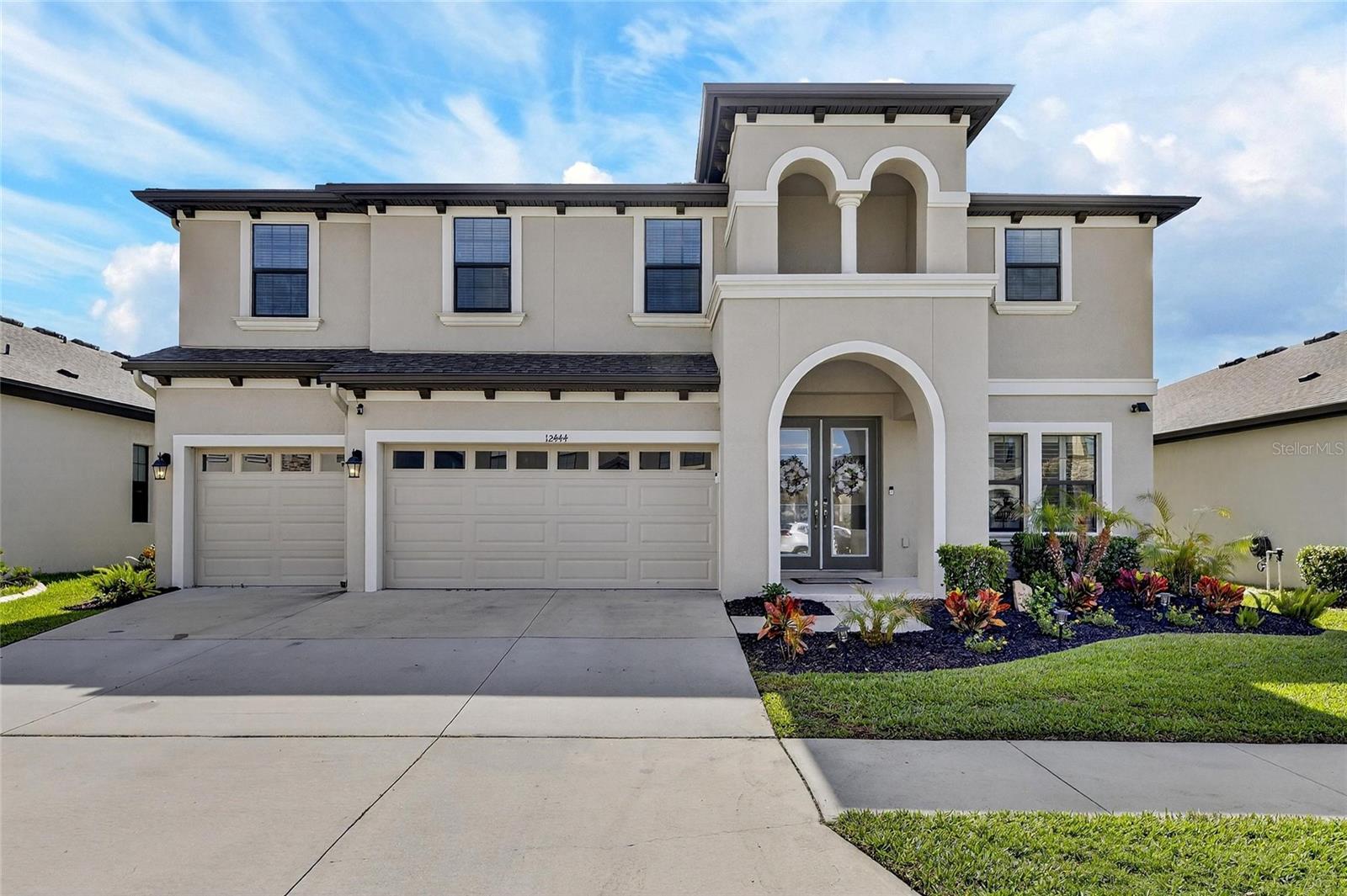 Don't miss this rare opportunity to step directly into a fully realized luxury lifestyle within Hawkstone's premier Phase 1 sector. 12444 Horseshoe Bend, is a striking 2021-built home that stands out with its premium conservation homesite and complete absence of rear neighbors, creating an elite sanctuary of privacy. The outdoor living space has been masterfully transformed into an entertainer's paradise, highlighted by a custom heated pool with smart-home automation and a fully equipped outdoor kitchen. The interior's thoughtful open-concept design flows seamlessly past a gourmet kitchen with quartz countertops and a massive central island into the light-filled living areas, all wired with a premium 5.1 surround sound system that extends into the massive upper loft. From the spa-inspired owner's suite with its tranquil forest views to the energy-efficient natural gas lines, hurricane-impact windows, and generator hookup, every detail of this home reflects exceptional care and sophistication. Conveniently positioned near Hawkstone's lap pools, playgrounds, dog parks, and premier local dining, this impressive turnkey property represents the absolute best of Lithia living—ready for its next chapter today.