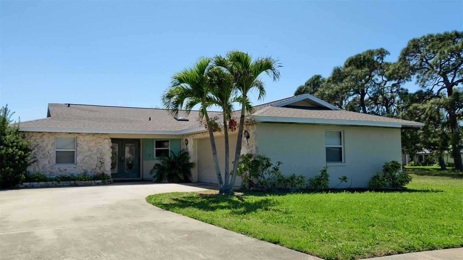 SUNSET ESTATES PARADISE! Welcome to this stunning 3-bedroom, 2-bathroom lakeview residence nestled within Sunset Estates, a highly desired and charming Northwest Bradenton community where coastal convenience meets serene lakeside living. No rental restrictions! From the moment you arrive, the pride of ownership is evident in this meticulously maintained property, which currently thrives as both a peaceful second home and a highly successful, income-generating VRBO vacation rental. Brand new shingle roof. Never flooded. Dwelling outside of flood zone.

INTERIOR FEATURES: Step inside to discover an inviting, sun-drenched interior defined by a spacious living room boasting dramatic vaulted ceilings and bright skylights that flood the space with natural Florida sunshine. Designed with functionality in mind, the home features a desirable split-bedroom floor plan that ensures ultimate privacy for everyone. The generous master suite serves as a private retreat, complete with its own dedicated en-suite bathroom.

KITCHEN AND LIVING: The open-concept kitchen is a chef's delight, fully equipped with modern stainless steel appliances, ample cabinetry, and a convenient breakfast bar that is perfect for casual morning coffee or entertaining guests. One of the absolute highlights of this home is the versatile Florida room, which offers a seamless indoor-outdoor feel and provides a scenic, tranquil vantage point overlooking your private pool and the peaceful neighborhood pond.

OUTDOOR OASIS: Step out back into your own personal tropical oasis. The backyard is beautifully landscaped, offering a serene environment for relaxing, family gatherings, or just lounging by the water.

UNBEATABLE LOCATION: This property delivers an unparalleled lifestyle for outdoor enthusiasts and beach lovers alike. You are situated just minutes away from the world-renowned, powdery white sands of Anna Maria Island. For those who love nature and adventure, you can spend your days biking, hiking, and kayaking through the breathtaking trails of the nearby Robinson Preserve and the historic DeSoto National Memorial Park. Boaters will also appreciate the unparalleled convenience of having several public boat ramps just a short drive away, offering easy access to the shimmering waters of the Gulf and the Manatee River.

INVESTMENT OR PRIMARY HOME: Whether you are searching for the perfect primary residence, a seasonal getaway, or a turnkey investment property with a proven track record, this home offers a rare opportunity to own a piece of paradise in Northwest Bradenton's most sought-after neighborhood. Schedule your showing today and start living the ultimate Florida lifestyle! *** Brandnew shingle roof * outside of floodplain and comes furnished ***