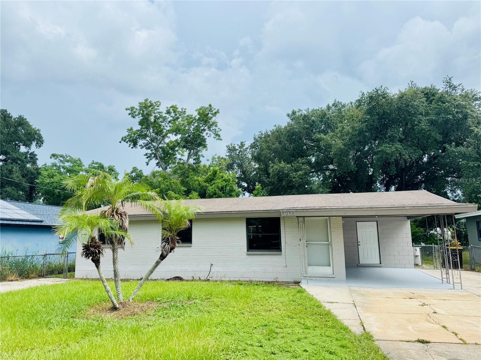 Welcome home to this charming 3 bedroom 2 bath concrete block home with NO HOA!This property features new flooring , fresh interior paint, and a bright inviting layout that's perfect for first-time buyers , downsizers or investors. Step outside to enjoy the fully fenced backyard, offering plenty of space for [ets,play or entertaining.Relax year-round on the screened-in back porch, the perfect spot for your morning coffer evening gatherings.Conveniently located near shopping, dining, schools and major roadways , this home combines comfort , value, and freedom with no HOA restrictions. Don't miss this great opportunity schedule your showing today.