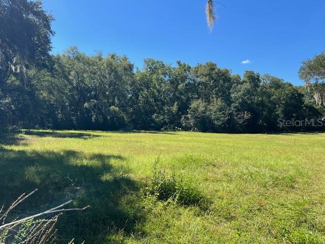 19- Acres of Vacant Land - Partially Cleared, Great for Building your Dream Farm- Just North of Ocala. Discover the perfect opportunity to own 19 Acres of beautiful, partially cleared land just north of Ocala. This versatile property is ideal for agriculture use, hobby farming, or building your dream home in the countryside. With access on two sides, this parcel offers excellent flexibility for planning, development or multiple entry points for farm equipment. The land features a mix of cleared and wooded areas, providing both open space for crops or livestock and a natural buffer zone for privacy. Located in a desirable area with easy access to Ocala's amenities and with an easy commute to WEC and Hits showgrounds while still enjoying the peace and quiet of rural living. Whether you're looking to start a farm, invest in land, or build a private retreat, this property offers a rare combination of convenience, space, and potential.