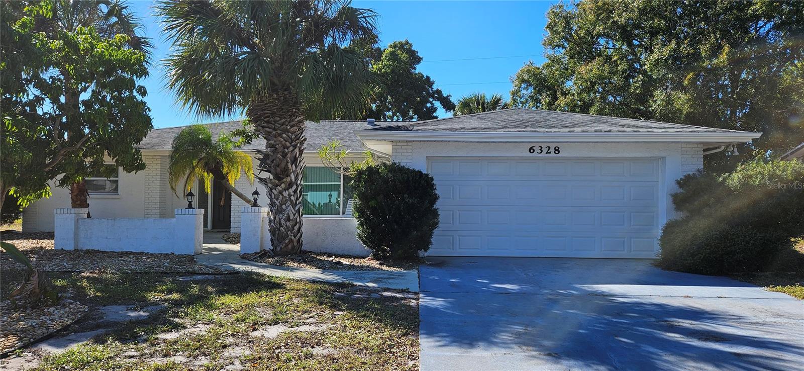 Furnished Florida Oasis Near Sarasota Bay. This remodeled 3-bedroom, 2-bathroom 2-car garage residence is situated on an oversized corner lot in the heart of Bayshore Gardens—and it’s mostly furnished for a turn-key move.  New Carrier AC installed 1st week of February 2026, the interior of the home was repainted in March.  The roof is 11 years old. This is more than just a home—it's an opportunity.
Offering exceptional flexibility and potential, this spacious and updated property is primed for your lifestyle, whether you seek a primary home, a relaxing vacation retreat, or a high-potential, income-producing rental. Best of all? NO HOA restrictions mean total freedom for you!
The updated kitchen truly anchors the home, boasting elegant granite countertops and sleek stainless steel appliances.  An open-concept flow to the dining and living spaces makes entertaining effortless.  The thoughtful, split-bedroom layout ensures privacy for everyone. The private primary suite offers a tranquil escape, complete with its own en-suite bath.  Guest bedrooms are ideally situated on the opposite side of the home, ensuring optimal separation and comfort for family and visitors. A convenient 2-car garage provides ample storage and parking.  Step outside to your spacious, private backyard framed by a covered lanai. This outdoor haven offers the perfect setting for grilling and dining al fresco, outdoor games, gardening, or simply relaxing in the Florida sun.  The backyard also has a fruit bearing lychee nut tree.  As a resident of the coveted Bayshore Gardens Park & Recreation District, you gain access to a full-service marina, boat ramp, kayak storage and fishing pier with direct access to Sarasota Bay, a Jr. Olympic-sized swimming pool, playground, ball courts, picnic pavilions, and banquet facilities.
Note to Buyer: The property is being sold AS-IS.