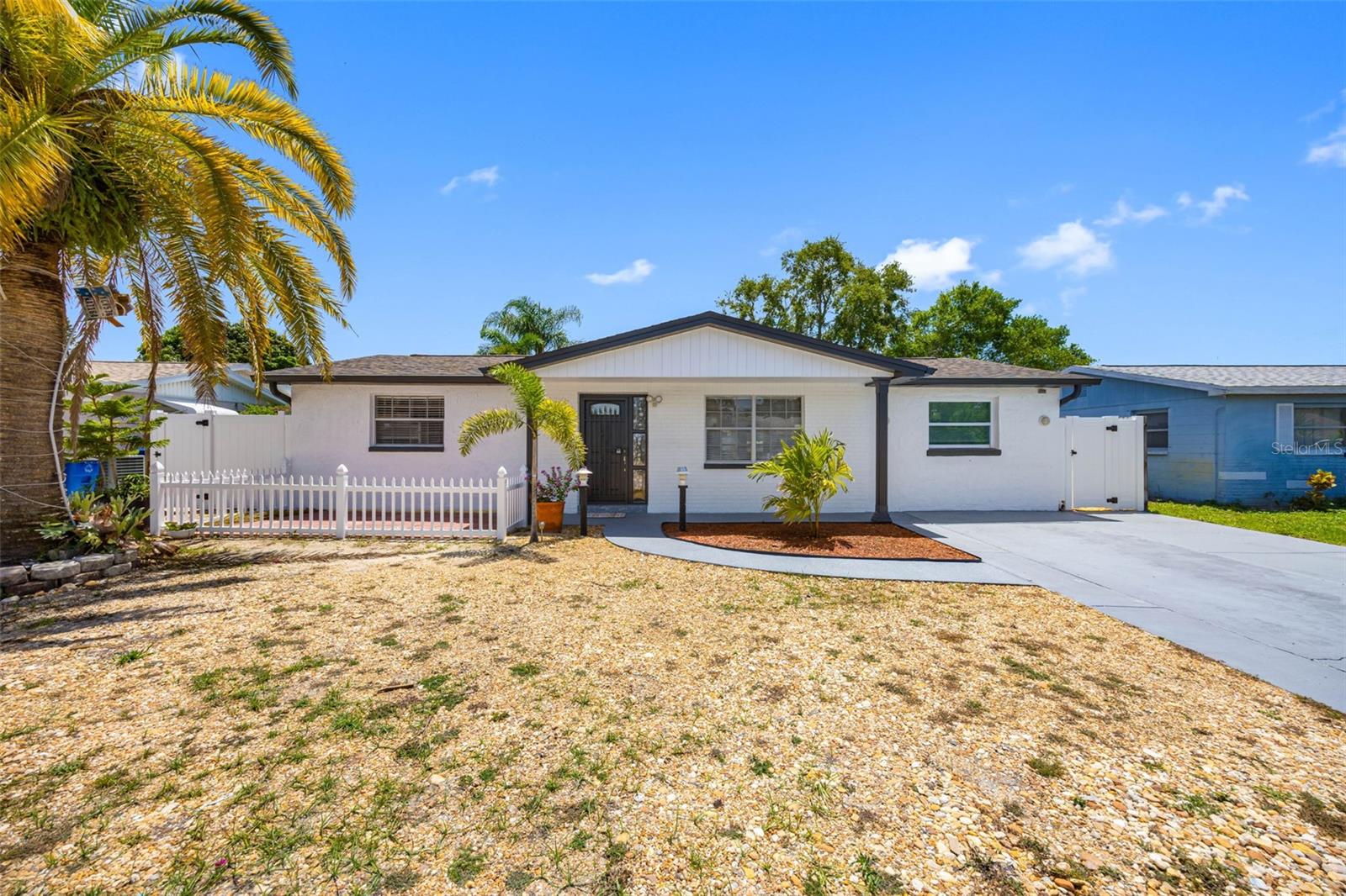 Welcome to this remodeled Oasis! This pool home has been tastefully remodeled with quartz countertops, new kitchen island, Luxury Vinyl flooring throughout the house, fully remodeled master bedroom and master bath with quartz countertops and a walk-in shower, ceiling fans throughout the house, new laundry room and a florida sunroom/dining room with plenty of natural light and a view to the pool/backyard. As you step outside, you will be delighted by all the entertaining you will be able to enjoy and provide to your friends and family! In-ground pool, wooden tiki bar, covered patio area with a wooden gazebo and plenty of potential for more to add. Storage is located in the backyard. Roof (2020), A/C unit and ductwork (2020), tankless water heater (2020), water softener, reverse osmosis system, upgraded modernized plumbing-pex piping (2020). No Flood insurance required.
