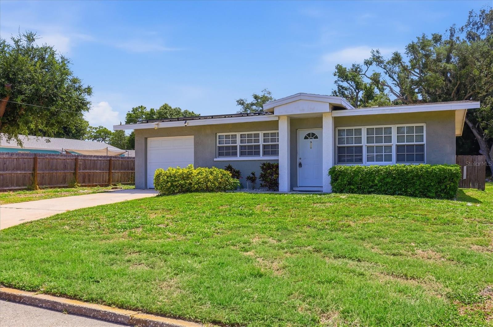 Priced to sell. This beautiful home was totally remodeled from top to bottom in 2019. It also had recently  Solar Panels installed worth $34000 . Which will be paid off at closing. Our loss is your gain .  All improvements and upgrades makes it just like a  BRAND NEW HOUSE! A charming house in a quiet peaceful neighborhood, well now is your chance! Extremely charming 2 bedroom, two bath sits on a extra large size lot in a great neighborhood! This Unique property located conveniently near downtown Palmetto, few minutes to the Regatta Point Marina and boat ramp on the Manatee River. Large open great room, plus a beautiful kitchen with soft-close cabinets and granite counter top! French Door in Master bedroom with large, newer model bathroom. Brand new all doors and windows, newer HVAC, new water heater, new roof, new plumbing and sewer system, new insulation, new tile whole house, new cabinets, new vanities, new sprinkler system, new appliances, and much more... Back yard has a concrete block shed. And a screened in lanai. Home is on public water supply and public sewer. New reclaimed water sprinkler system just installed for the yard. All room sizes are approximate. Please use AS-IS contract.