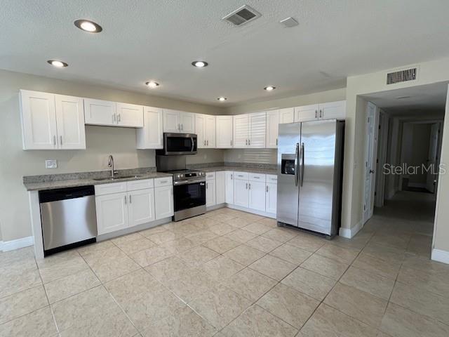 TUDOR CAY CONDO - Residential