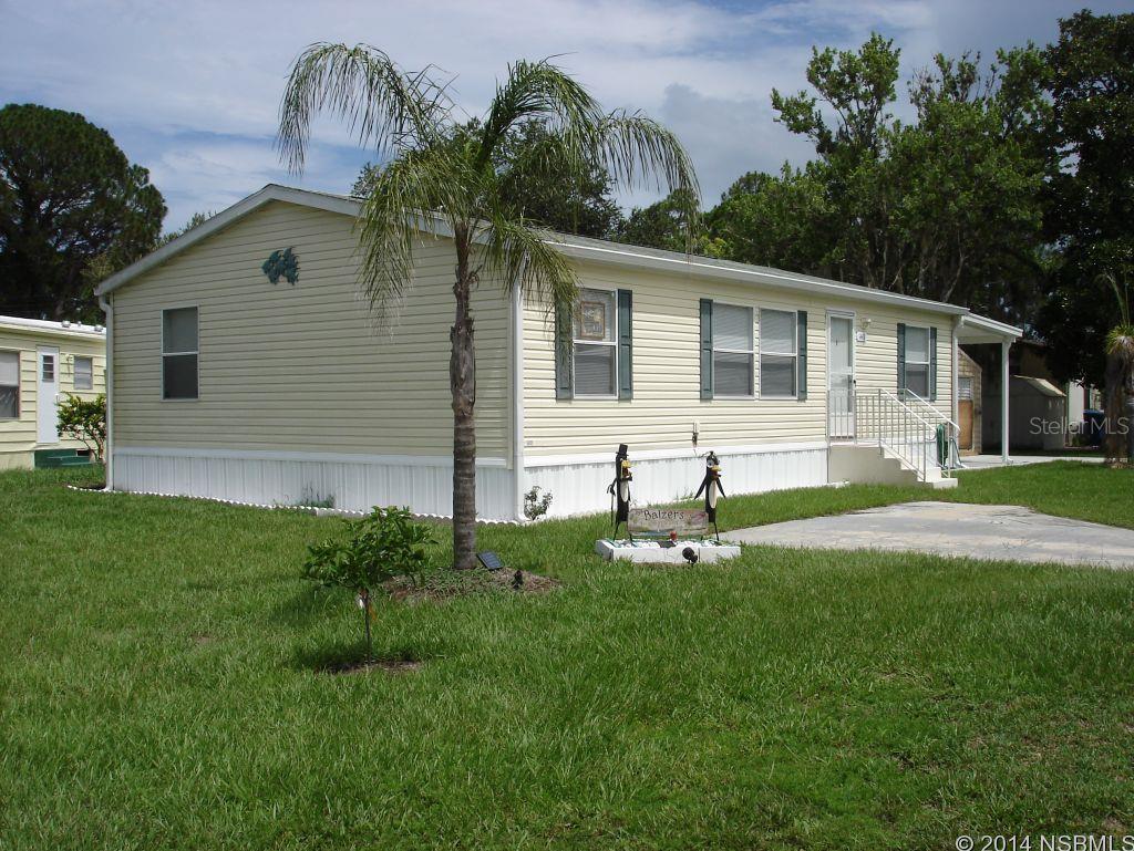 Riverfront Community home with direct intracoastal access. You own this land; no lot rent to pay. Built in 2008, this pristine Skyline home meets or exceeds Florida's wind load standards. It's only been one year on this lot, is like brand new and is being offered completely furnished.There's an eat in kitchen with lots of cupboards and counter space. Newer appliances, including a side by side refrigerator with water an ice on the door. Wall to wall carpeting in the bedrooms and Florida room: vinyl (waterproof) pergo in the kitchen, laundry, baths and closets. Brand new Robin brand 12"X20' aluminum shed/garage built to withstand 160 mph winds. Two driveways. Termite bond includes subterranean termites. This home is a must see. Community amenities include: Clubhouse, two pools, 300' fishing pier, boat ramp and launch, bocci courts. ;Water: City