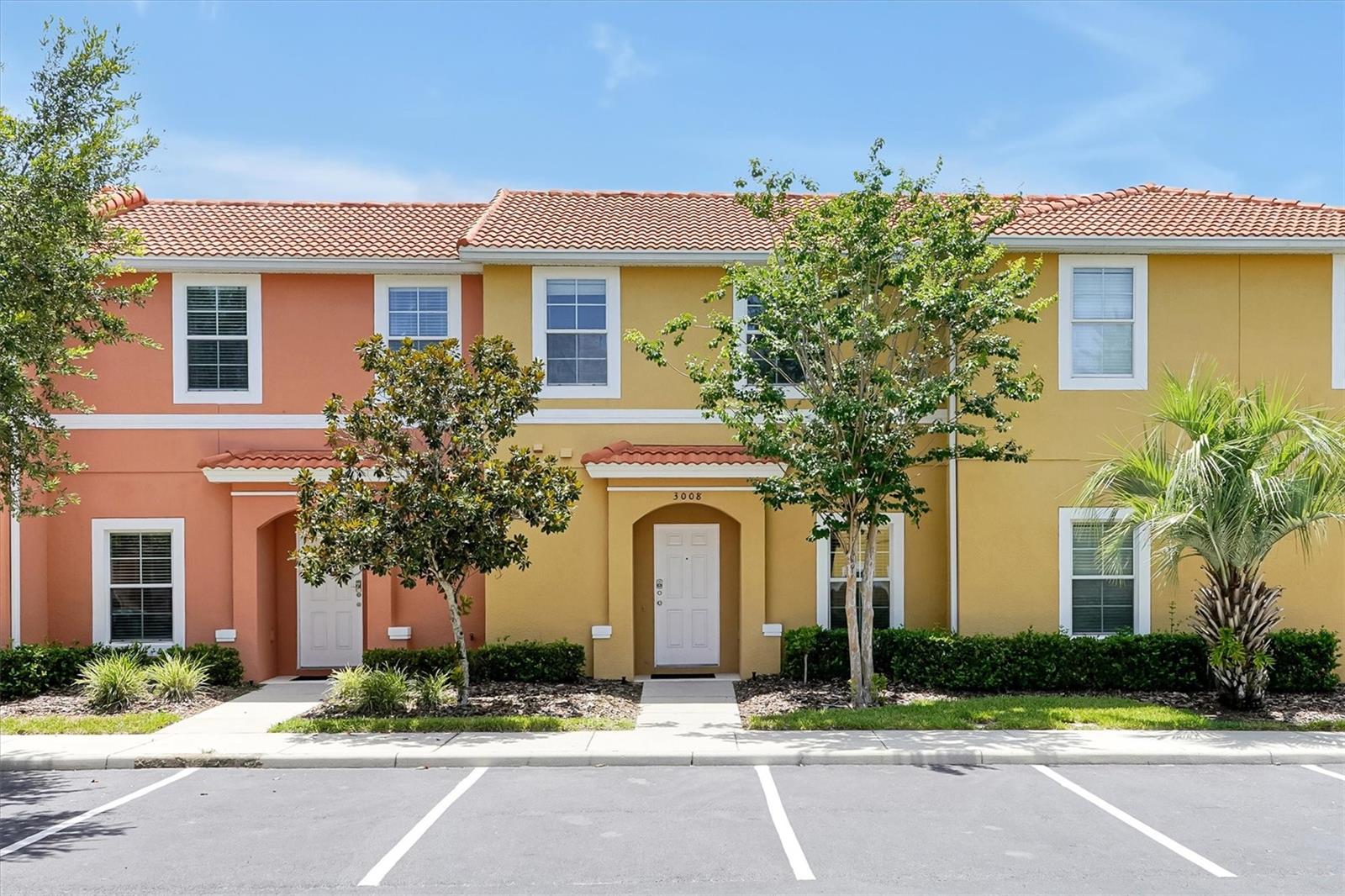 Turnkey professionally managed 2 BD 2 B.5 Baths short term rental townhome located in the gated community of Encantada Resort, just minutes from Walt Disney World Resort. This established vacation rental is actively operating and has generated substantial gross revenue offering a seamless hands-off investment opportunity from day one. The home features an open concept main level with living/dining combination, open kitchen with granite countertops, powder room and laundry. Sliding doors open to a private outdoor lanai with an elevated view, heated hot tub a highly desirable amenity that drives higher nightly rates and repeat bookings. Upstairs a private ensuite primary bedroom, 1 ensuite guest room that provides privacy and flexibility for short term guests. Encantada Resort is short term rental approved with no rental caps and offers resort amenities including 2 pools, clubhouse, fitness center and gated security. The HOA covers exterior maintenance and amenities supporting consistent occupancy while minimizing owner involvement. Professional short term rental management is already in place and will remain, allowing the next owner to step into a proven operation without disruption. Offered as a true turnkey investment in one of Central Florida's most established vacation rental communities.