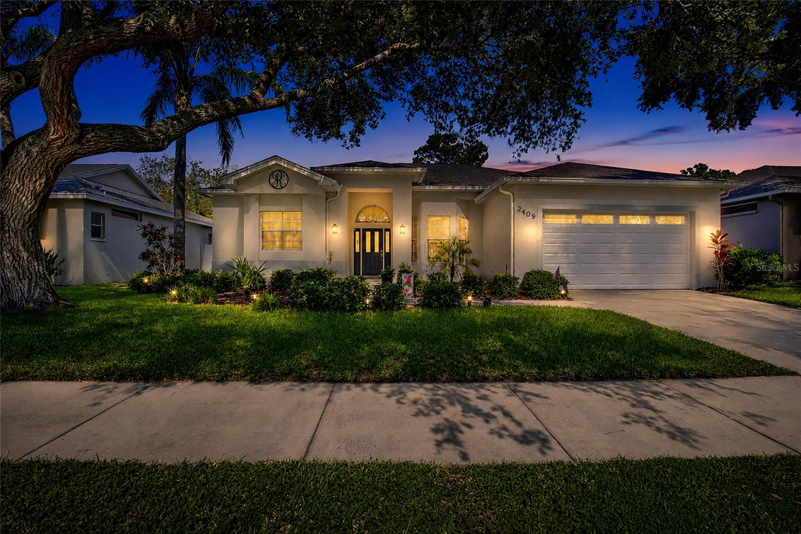 Welcome to your private Florida retreat. Beyond the entry, a well-appointed formal living and dining area offers an inviting setting for gatherings, enhanced by an open layout ideal for entertaining. The newly renovated kitchen features updated appliances, granite countertops, and generous workspace flowing seamlessly into the family room.

The private primary suite is a serene escape with an updated en-suite bath and dual closets, plus direct access to the enclosed pool and lanai. Two additional spacious bedrooms are situated on the opposite side of the home and share an updated bathroom, creating a convenient split floor plan—perfect for guests or a dedicated home office.

With 3 bedrooms, 2 bathrooms, and a screened-in private pool, this home delivers the ultimate staycation lifestyle. Enjoy a premier location walking distance to Philippe Park and just a short drive to charming downtown Safety Harbor.