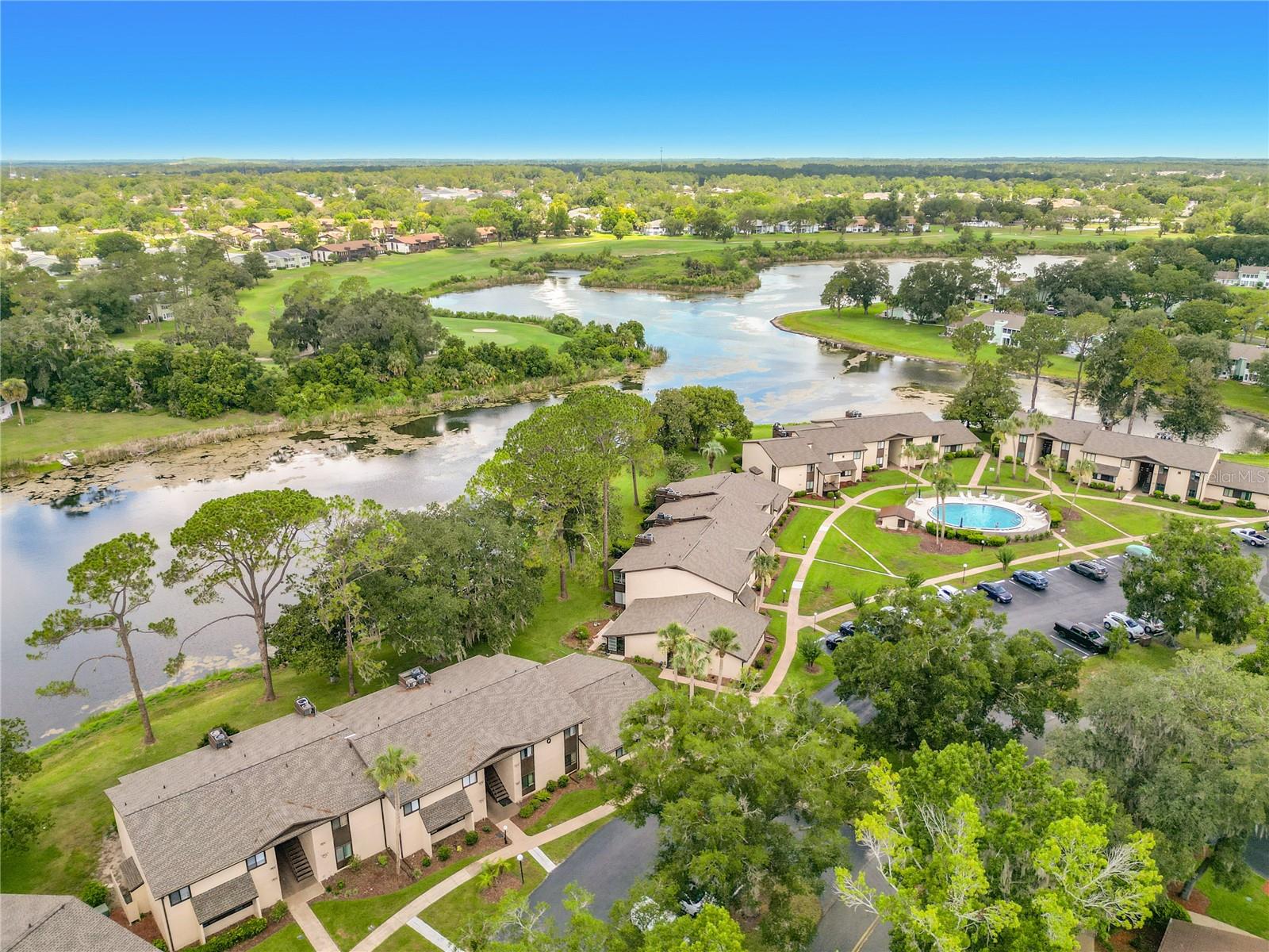 Welcome to easy Florida living in this beautifully renovated 2-bedroom, 2-bath home located in a desirable 55+ community. This move-in-ready residence features a stunning new kitchen with modern finishes, updated bathrooms, and tasteful upgrades throughout. Relax and enjoy breathtaking pond views from the enclosed lanai, offering the perfect space for morning coffee or evening unwinding.

Residents enjoy access to exceptional community amenities with a low HOA fee that includes a clubhouse and sparkling pool, in addition it also covers basic cable, trash service, and exterior maintenance, providing convenience and low-maintenance living. Don't miss this opportunity to own a beautifully updated home with picturesque water views in a vibrant active-adult community!  Come live the Florida lifestyle.