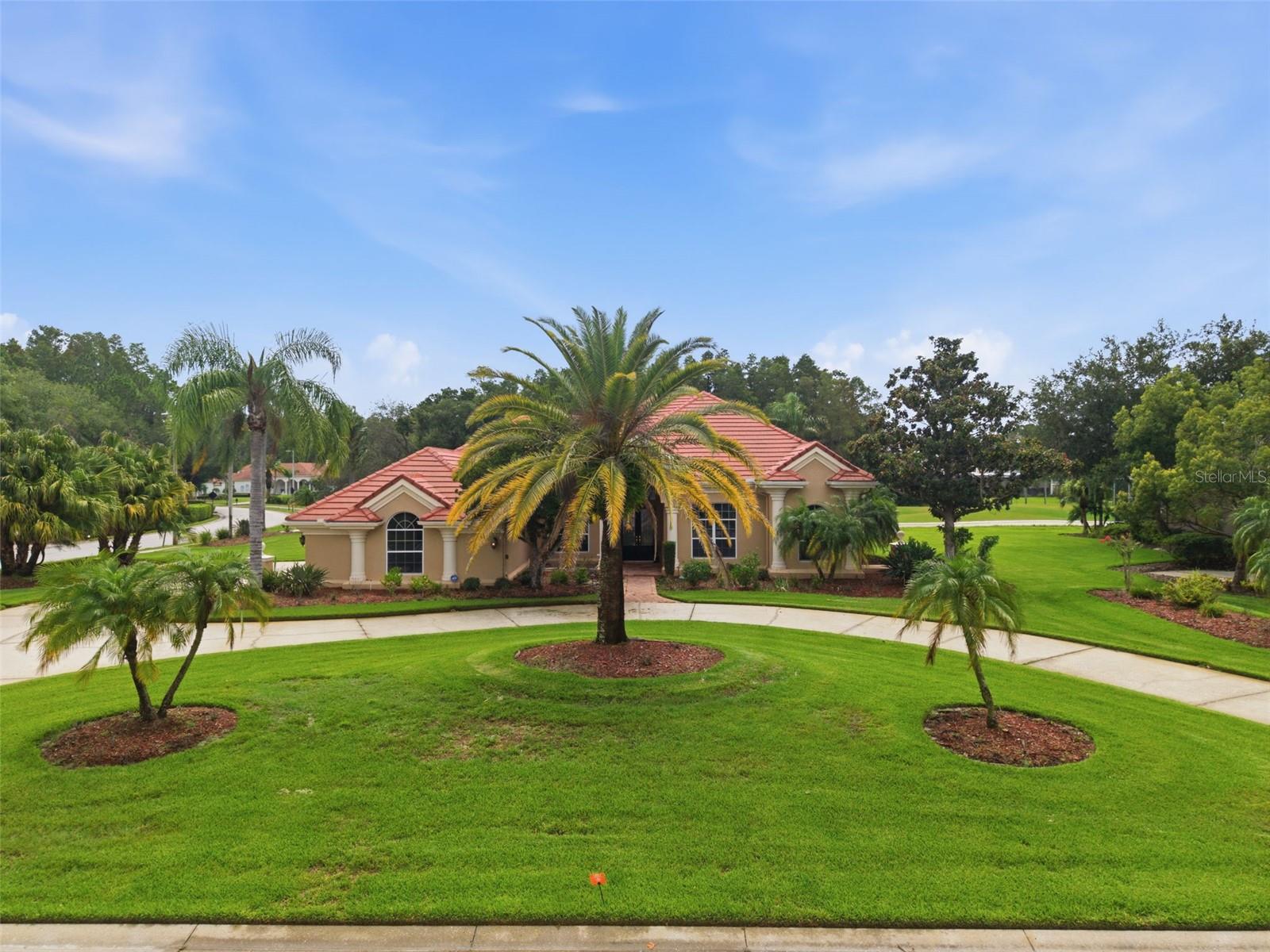 Welcome to luxury living in the highly sought-after, guard-gated Cheval East community! Perfectly positioned on over a ½ acre overlooking the 4th hole of Cheval Golf & Country Club, this beautifully remodeled residence offers an exceptional blend of timeless elegance, thoughtful design, and resort-style outdoor living.

Featuring 4 bedrooms, 3.5 bathrooms, this thoughtfully designed split floor plan offers both privacy and flexibility. The private primary suite is a true retreat, featuring a luxurious spa-inspired bath with two custom walk-in closets, separate his-and-her vanities, a relaxing soaking tub, and an oversized walk-in shower. Two secondary bedrooms are located off the spacious family room, with one offering an en suite bath and the other conveniently located adjacent to a full hallway bathroom. A fourth bedroom at the front of the home is currently being used as an office, making it ideal as a private workspace, guest room, or bedroom.

At the heart of the home is the beautifully remodeled chef’s kitchen featuring rich dark wood cabinetry, a premium Sub-Zero refrigerator (2025), Bosch dishwasher (2025), designer tile backsplash, luxurious high-end granite countertops, a 6-burner gas cooktop, separate built-in oven, and microwave. The kitchen opens to a spacious family room highlighted by a cozy gas fireplace, creating the perfect gathering space for family and friends.

The home also features an elegant formal living room and large formal dining room, offering beautiful spaces for entertaining and hosting holidays or special occasions.

Designed with both luxury and functionality in mind, the home includes a beautifully RENOVATED LAUNDRY ROOM (2025)with quartz countertops, abundant CUSTOM cabinetry and NEW WASHER/DRYER, an oversized butler’s pantry (2025), and a CUSTOM FAMILY DROP ZONE with additional built-in storage refrigerator, wine refrigerator with quartz counters(2025) . Every bathroom is appointed with premium TOTO toilets, reflecting the home’s commitment to quality throughout.

Step outside to your own private backyard oasis. The beautiful travertine paver lanai surrounds the resurfaced Pebble Tec pool accented by a decorative outdoor fountain. The spectacular outdoor living area is an entertainer’s dream, featuring a built-in Alfresco grill, granite countertops, bar seating, a 60,000 BTU wok burner, and a remote-controlled aluminum pergola that provides shade at the touch of a button for year round entertaining (2025).

Additional improvements include a TILE ROOF (2013) and TWO NEW HVAC systems (2024), providing peace of mind and lasting value.

Located within the highly sought-after Steinbrenner High School District, Cheval is one of Tampa Bay’s premier gated communities, known for its mature oak-lined streets, scenic golf course views, and exceptional lifestyle. Residents have the opportunity to join the Cheval Athletic Club, Cheval Golf Club, and enjoy access to the renowned TPC Tampa Bay Golf Course through optional memberships available for an additional fee.

Ideally located near upscale shopping, dining, medical facilities, and major highways, this exceptional residence offers the perfect combination of luxury, comfort, and one of Tampa Bay’s most desirable addresses.