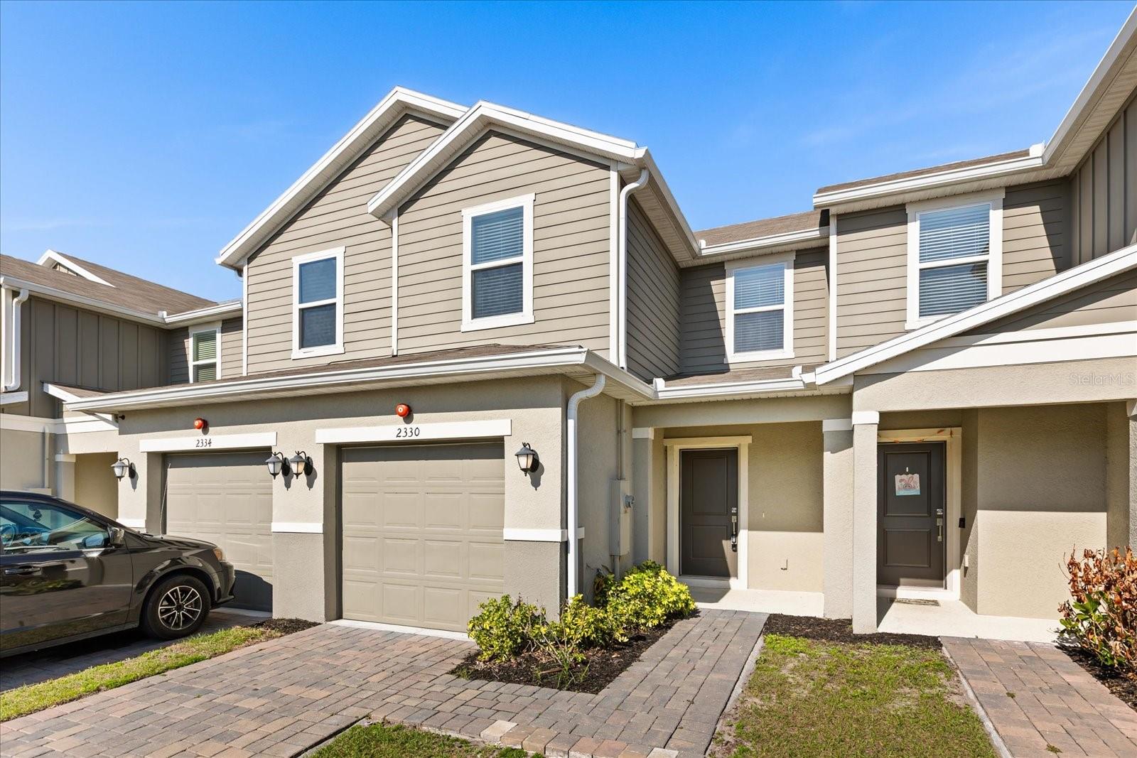 Welcome to 2300 Carrabelle Way in the Landings at Riverbend, Sanford! Built in 2022, this low-maintenance Townhouse features an open-concept floor plan. The kitchen offers a breakfast bar, granite countertops, a large, and a full suite of stainless-steel appliances, opening to the spacious great room with sliding glass doors to the backyard and double windows providing abundant natural light. The main level also includes a half bath and a large walk-in storage closet. Upstairs, you'll find baths, and a convenient inside laundry area with additional storage. The spacious primary suite features west-facing windows, a walk-in closet, and a private dual-sink en-suite bath. Bedrooms 2 and 3 offer east-facing windows and share a full guest bath. Community amenities include a pool, sidewalks, and maintained grounds. Conveniently located near Sanford International Airport, Boombah Sports Complex, downtown Sanford, the Riverwalk, Lake Monroe, and the Central Florida Zoo, with easy access to major highways for commuting and recreation. Schedule your private showing today!