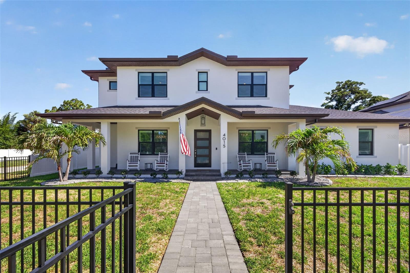 Welcome to this exceptional Devonshire-built estate in the heart of South Tampa, ideally situated in a non-flood zone. Meticulously maintained and thoughtfully designed throughout, this stunning home offers 6 bedrooms, 5 full bathrooms, and 2 half bathrooms, including an outdoor pool bath, plus 2 additional versatile rooms that can serve as offices, a formal living area, gym, craft room, or whatever fits your lifestyle. With 5,108 heated square feet, a 3-car garage, and a large corner lot just under a quarter acre, homes of this caliber are a RARE FIND in South Tampa. The open, flowing floor plan features a first-floor primary suite, dual laundry rooms upstairs and downstairs, and an upstairs loft surrounded by spacious en-suite bedrooms. Every bedroom includes a walk-in closet, and all closets throughout the home are outfitted with custom shelving systems, providing exceptional storage and organization. Designed with convenience in mind, the home also features a dog door for your furry family members and UV lights integrated into the HVAC system to help improve indoor air quality. For added peace of mind, the home includes an A/C warranty. The backyard is an entertainer’s dream with a screened, heated saltwater pool and spa, covered outdoor seating, built-in grill, kegerator, and a turfed yard for easy maintenance. The upgraded pool package includes additional drainage and permeable pavers, creating a beautiful outdoor living space. Enjoy evenings on the charming front porch enclosed by a black wrought-iron fence, adding extra space for play or relaxation. Inside, the grand entry welcomes you with a view of the sparkling pool, a formal dining room with coffered ceilings, and a private office. The great room and gourmet kitchen create the perfect gathering space, highlighted by French doors to the lanai, an electric fireplace with supplemental heat, Sub-Zero refrigerator, Wolf appliances, double ovens, pot filler, butler’s pantry with wine fridge, abundant cabinetry, and a spacious walk-in pantry. Natural gas service enhances the home's efficiency. The primary suite is a true retreat with a coffered ceiling, abundant natural light, and a spa-inspired bath featuring a freestanding tub, oversized walk-in shower with dual rainfall shower heads, and an expansive double vanity with generous storage. Upstairs, spacious en-suite bedrooms surround the central loft, offering separation for family and guests alike. Additional features include hardwood flooring throughout, plantation shutters, surround sound with Sonos receiver, a dedicated tech closet, epoxy garage flooring, landscape lighting, concrete curbing around the flower bed, whole-home water filtration and softener system, tankless water heater, and a thoughtfully designed floor plan. Impeccably maintained and located in a fabulous walkable neighborhood just steps from Cal Dickson Tennis Center and Tampa Bay Little League, this exceptional home is also close to top-rated schools, shopping, dining, and everything South Tampa has to offer. Zoned for Grady Elementary, Coleman Middle School, and Plant High School. Schedule your private showing today and experience one of South Tampa’s finest homes for yourself.