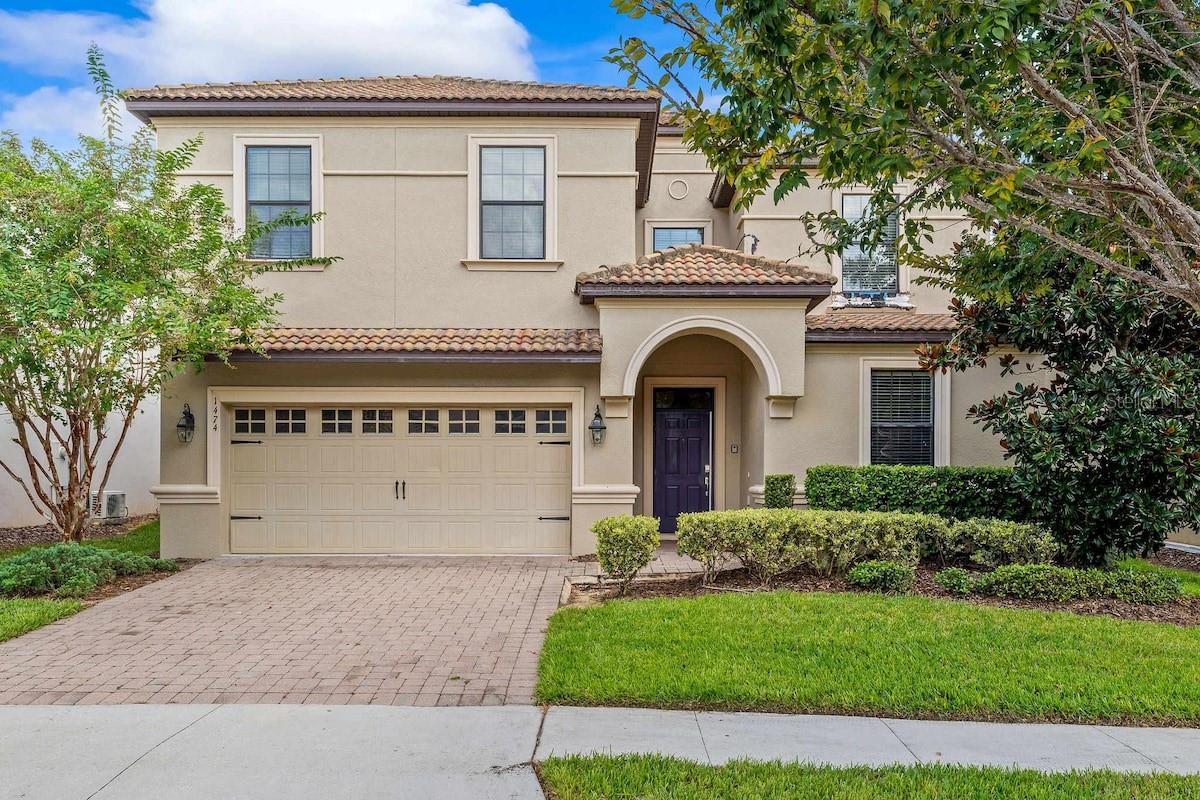 Welcome to this stunning 9-bedroom vacation home located in the highly desirable The Retreat at ChampionsGate resort community. Offered fully furnished and professionally decorated, this turnkey property is rental-ready and ideal as a vacation home, short-term rental investment, or personal retreat.

The spacious floor plan features luxury primary suites on the main level, generously sized guest bedrooms upstairs, multiple gathering areas, and an open-concept living, dining, and kitchen space designed for entertaining. The well-appointed kitchen includes stainless steel appliances, while flat-screen televisions throughout the home provide comfort and convenience for guests and owners alike.

Step outside to your private screened lanai featuring a heated pool, spa, covered patio, and ample space for relaxing and enjoying Florida's year-round sunshine.

Owners and guests enjoy access to ChampionsGate's world-class resort amenities, including a water park with lazy river, water slides, splash pad, swim-up bar, waterfalls, spa, fitness center, movie theater, game room, tiki bar, grill, cabanas, and clubhouse.

Sold fully furnished with all appliances included, this exceptional property is ready for immediate enjoyment and income potential. Property is being sold As-Is.