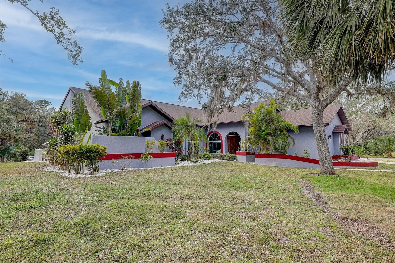 Experience Unmatched Luxury on 5 Serene Acres in Venice, Florida. 

Welcome to your private oasis—an exquisitely renovated estate offering the perfect blend of elegance, comfort, and space. Situated on 5 lush acres in beautiful Venice, FL, this 4-bedroom, 5-bathroom residence has been fully updated with a high-end design throughout. 

Here the main house has three bedrooms, each with private attached baths, and four full bathrooms. The detached guest house offers an additional bedroom and bathroom. Each spacious bedroom in this home offers its own en-suite bath, creating a true retreat for family and guests alike.

Step inside to discover a light-filled, open-concept layout featuring soaring ceilings and loads of natural light. The chefs kitchen has endless countertops with brand new quartz stone surface, ample cabinetry and opens up into the massive great room. This oversized great room has cathedral ceilings, stacked stone and marble fireplace and a large entertaining area.

The primary bedroom is a true retreat with vaulted ceilings, large walk-in closet, soaker tub and double vanity. There is an oversized glass door leading to the pool area. Here you will find true relaxation morning or night!

Outdoors, enjoy Florida living at its finest. The expansive grounds are beautifully landscaped for privacy and tranquility, while the resort-style pool and spa provide a serene setting for relaxation or entertaining. Outside you have covered lanai, outdoor kitchen area, in-ground salt water pool with raised hot tub featuring a cantilever warerdall.  And an expansive decorative paver area for hosting your friends and family.

Whether you’re sipping coffee on the patio or hosting under the stars, this estate delivers the luxurious lifestyle you’ve been dreaming of—just minutes from beaches, golf, and downtown Venice.

Horses and other livestock are permitted at this location. 

In the past three years this home has a new 30 year roof, impact windows and sliding doors, garage doors, three zones of new HVAC, and a completely rebuilt pool and spa. The list of upgrades goes on and on. Call today for your comprehensive list of upgrades or to schedule a showing today!