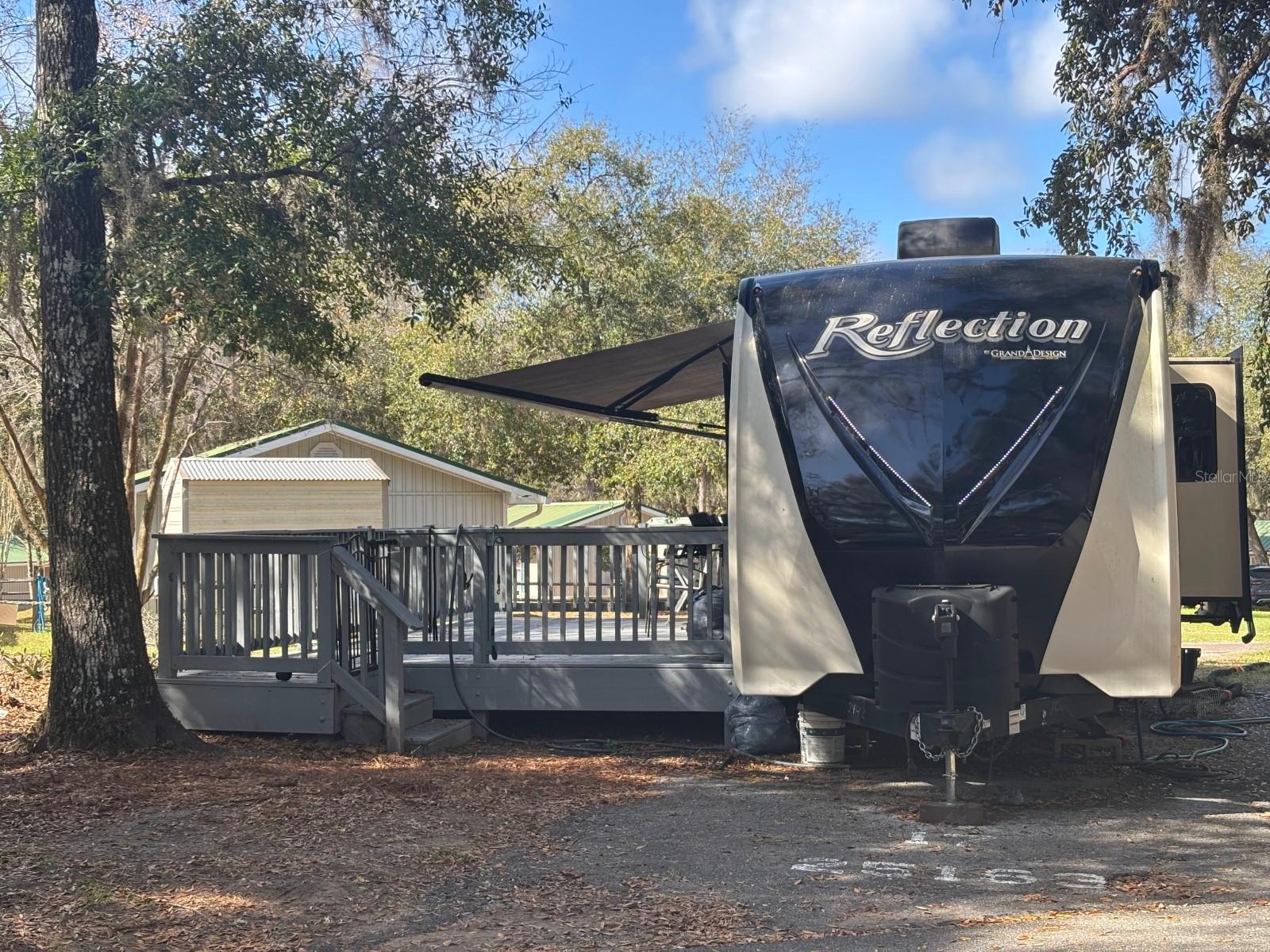 DEEDED LOT – FULL TIME OR PART TIME! Great location! Located a stone throw away from the lake - Reconnect with nature and make your memories at the popular Salt Springs Resort. Salt Springs Resort is a gated resort / campground located in the heart of the 383,000-acre Ocala National Forest and on the shores of Little Lake Kerr in Salt Springs, Florida. Nestled amidst 100-year-old oaks covered in Spanish moss, the resort is clean, rich in nature, with small town charm. Come and share a relaxing atmosphere with family and friends. Along with the relaxed atmosphere, our surroundings include a spacious lakefront lodge, a boat ramp and fishing dock,1 adult pool,1 family pool,1 kiddie pool and a spa, ¼ mile of lakefront, horseshoes, shuffleboard, billiards, tennis courts, basketball, and much more. Hikers have easy
access to the Florida National Scenic Trail, and the many surrounding rivers, two of the top ten bass fishing lakes, and streams provide ample opportunity for water activities. Whether enjoying the blue waters of Little Lake Kerr or the wilderness of the Ocala National Forest, you will find the area unique, diverse, and accommodating. ***The 2019 Reflections RV will remain on the Lot and will be a separate sale between the Seller & Buyer.