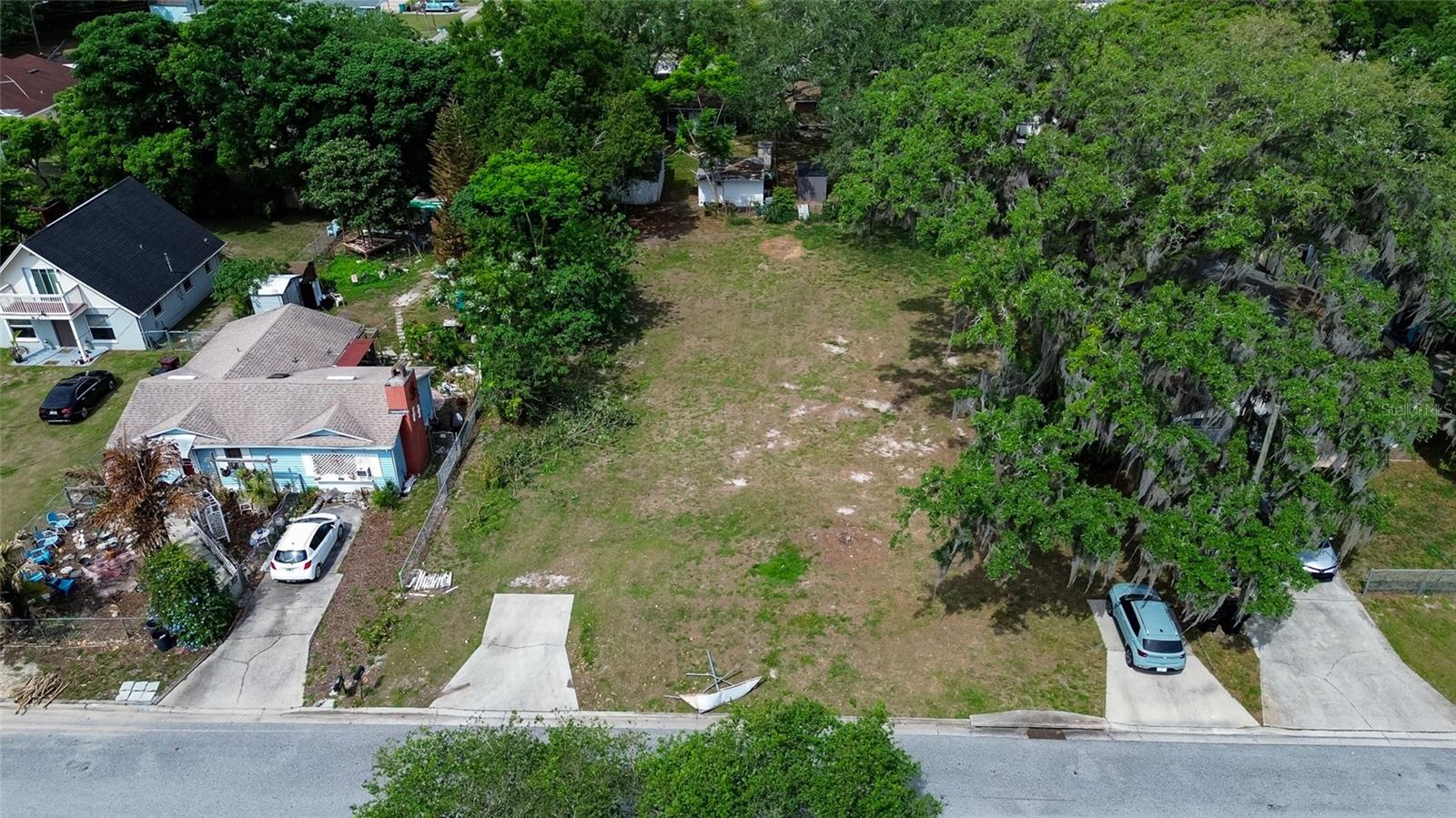 2 LOTS!!!   Prime Orlando location in one of the city’s most convenient neighborhoods—just minutes to the 408, Orlando International Airport, Downtown Orlando, and all major conveniences—with NO HOA! Tucked away at the end of a quiet dead-end street, this property offers added privacy and minimal traffic.  This parcel previously had a home, which was demolished in 2023 per county permit, creating a blank slate for your vision. The property consists of two lots - .31 acre - and may offer the potential to divide (buyer to verify with local authorities), presenting a unique opportunity for builders, investors, or those looking to create a custom residence.  With no HOA restrictions, this property is ideal for both primary homeowners and savvy investors. Zoned for top-rated schools, including Boone High School. Conveniently located just minutes from premier shopping, dining, and entertainment, with easy access to major highways, allowing for quick trips anywhere in the city.  The expansive lot provides ample space for outdoor living, recreational use, or for pets to roam freely. A rare opportunity to secure a large homesite in a central Orlando location with endless potential.