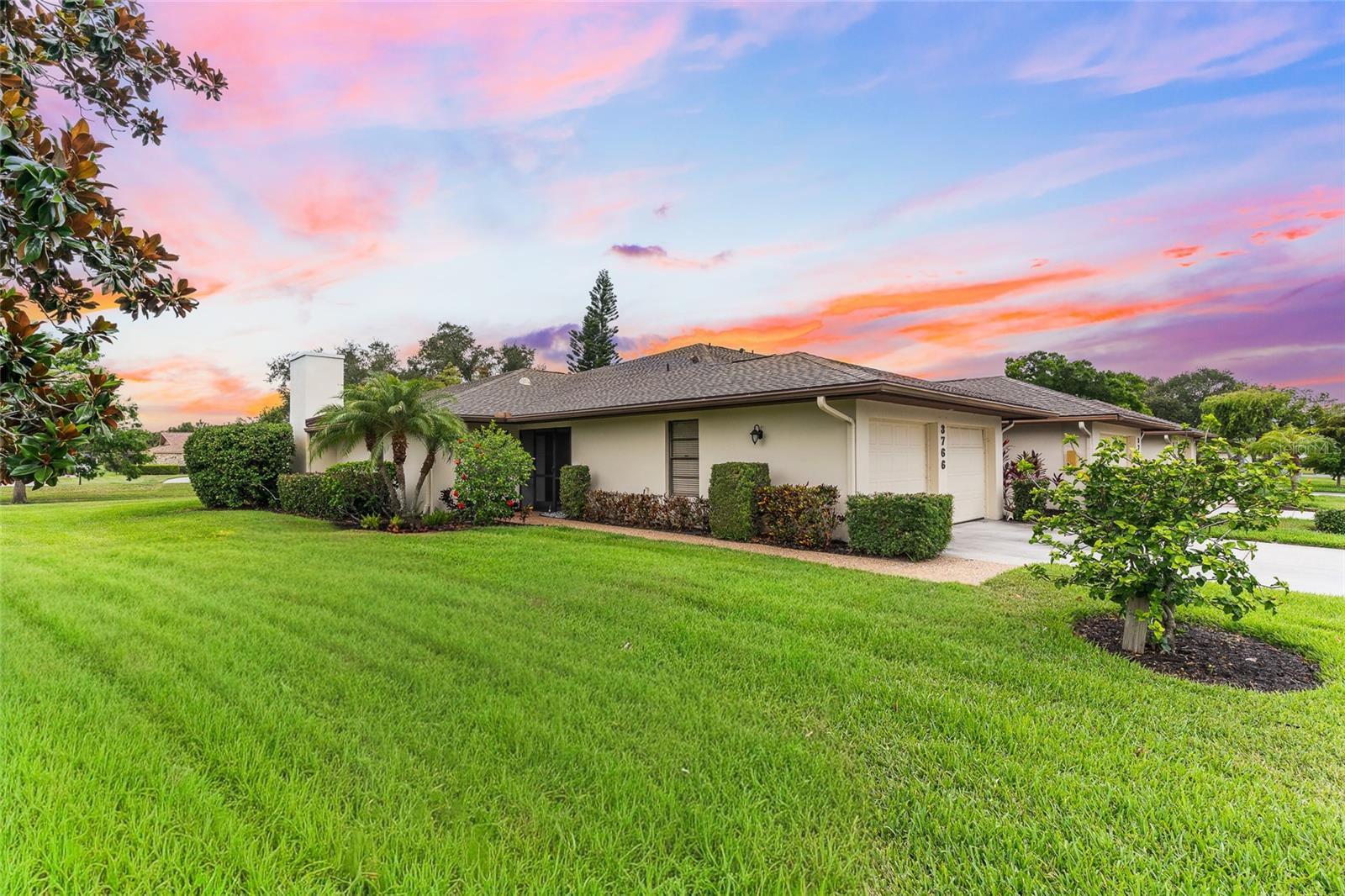 Virtually Staged. Experience effortless living in this tastefully updated maintenance-free home in a gated community minutes from the world-renowned Siesta Key Beach. Entering the home, be struck by the spacious interior and design elements perfectly crafted to enjoy the Florida lifestyle. The upgraded kitchen offers everything a chef could desire; granite counters with lots of space to prepare any meal, tons of cabinet space, newer stainless steel appliances, and a breakfast nook. The main living area features direct access to the very large covered screened lanai where a favorite beverage can be enjoyed for the sunrise or sunset with peaceful views of the very well maintained community green, or where guests can seamlessly enjoy the indoor/outdoor Florida weather. The primary suite is split from the other bedroom bath and offers lanai access, an ensuite bath with two vanities, shower, and a walk in closet capable of handling the most extensive wardrobe. The guest bedroom is separate, has an updated shower and allows privacy for guests to access the second bedroom. A very large flex space for an office or den compliments the rest of the interior space. The roof was recently replaced and the HVAC is a little over one year old with a transferable warranty. Ballantrae is in the heart of Palmer Ranch, minutes from Siesta Key, Costco, Gulf Gate for funky shopping or dining, and very easy access to downtown Sarasota with its cultural offerings and first class healthcare.