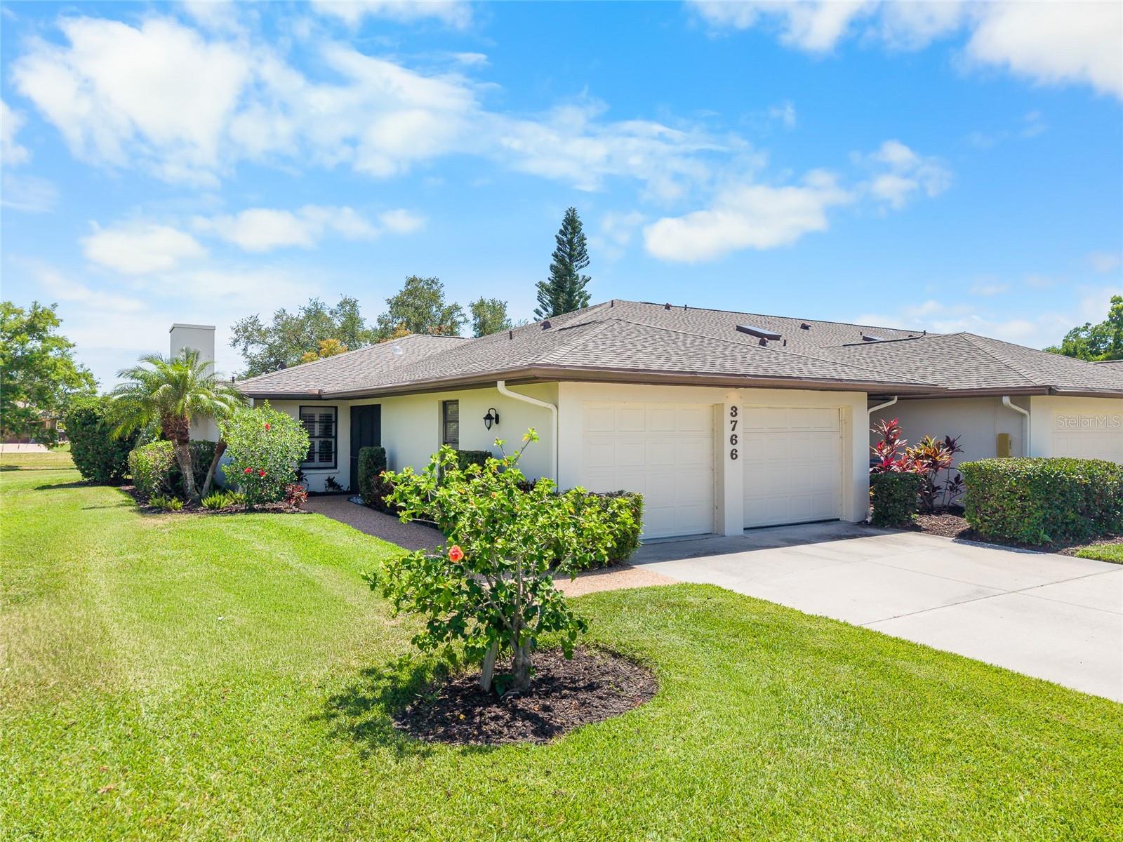 One or more photo(s) has been virtually staged. Experience effortless living in this tastefully updated maintenance-free home in a gated community minutes from the world-renowned Siesta Key Beach. Entering the home, be struck by the spacious interior and tasteful design elements perfectly crafted to enjoy the Florida lifestyle. The upgraded kitchen offers everything a chef could desire; granite counters with lots of space to prepare any meal, tons of cabinet space, newer stainless steel appliances, and a breakfast nook. The main living area features direct access to the very large covered screened lanai where a favorite beverage can be enjoyed for the sunrise or sunset with peaceful views of the very well maintained community green, or where guests can seamlessly enjoy the indoor/outdoor Florida weather. The primary suite is split from the other bedroom bath and offers lanai access, an ensuite bath with two vanities, shower, and a walk in closet capable of handling the most extensive wardrobe. The guest bedroom is separate, has an updated shower and allows privacy for guests to access the second bedroom. A very large flex space for an office or den compliments the rest of the interior space. The roof was recently replaced. Ballantrae is in the heart of Palmer Ranch, minutes from Siesta Key, Costco, Gulf Gate for funky shopping or dining, and very easy access to downtown Sarasota with its cultural offerings and first class healthcare.