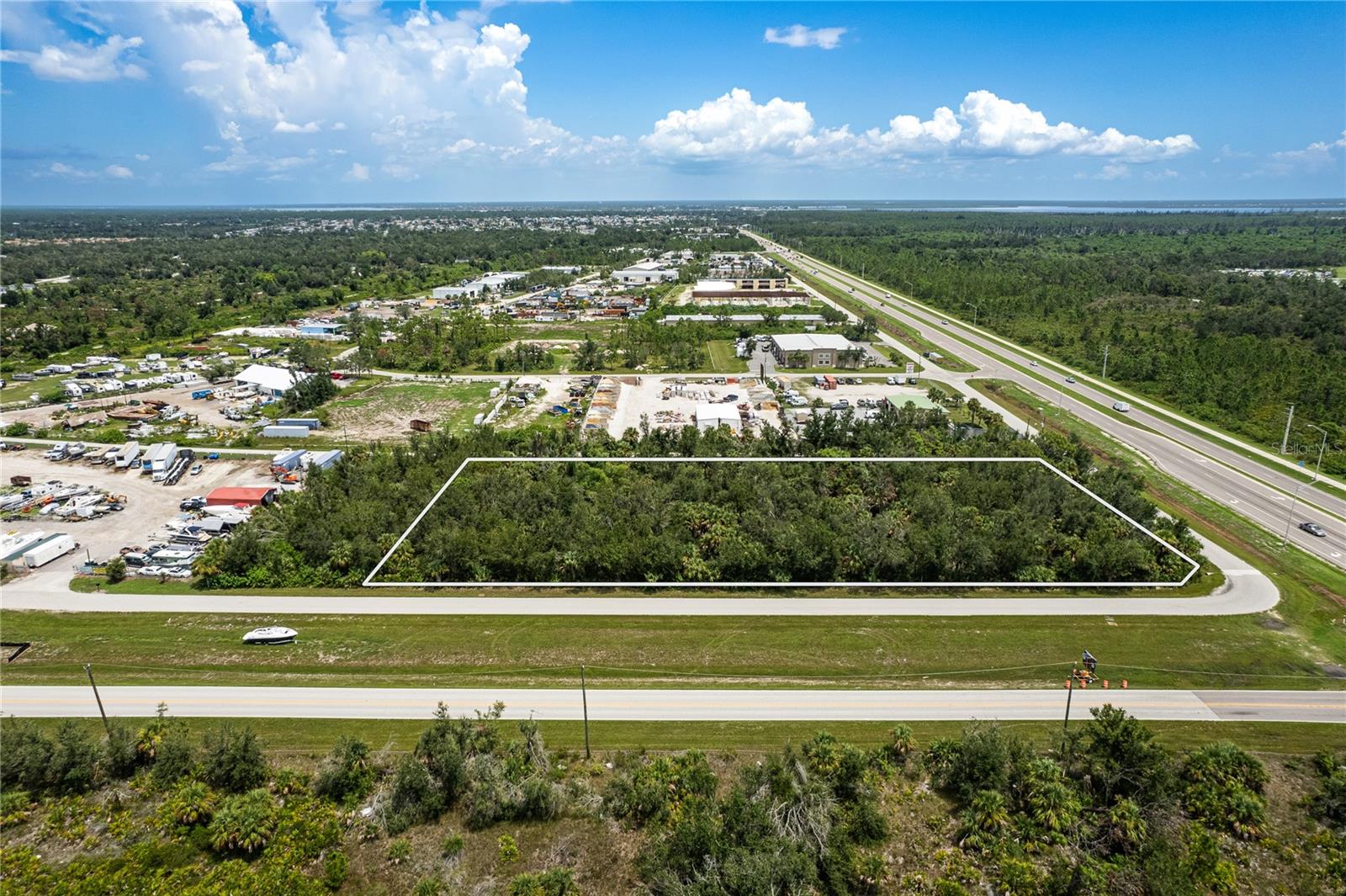 Up for sale is an assemblage of 5 parcels on the SW corner of Gasparilla Road and Marathon Blvd in a growing area of Charlotte County Florida.  The property is located on the main and only roadway that takes vehicular traffic to Boca Grande Island, both Gasparilla islands, Rotonda Lakes, Rotonda Meadows, Rotonda Villas, Coral Creek airport, and one of the fastest growing neighborhoods in Port Charlotte, South Gulf Cove.  Several national builders are active within a few miles' radius of the subject property and traffic counts are growing by the month.  The County is in the process of expanding Marathon Blvd directly in front of the property, with construction currently underway. There is a service road bordering the parcels on both Gasparilla Road and Marathon Blvd, and there is third service road located on the backside of the parcels to the North, giving the property maximum access from every direction.  The zoning designation is Commercial General, (CG), which provides a large number of potential uses.  This particular thoroughfare is hungry for additional commercial to service the existing and future residents that are flooding the area.  There are many potential uses for these parcels that could quickly turn into immediate revenue.  A full market study was just completed and is available upon request.  Call today for more information...