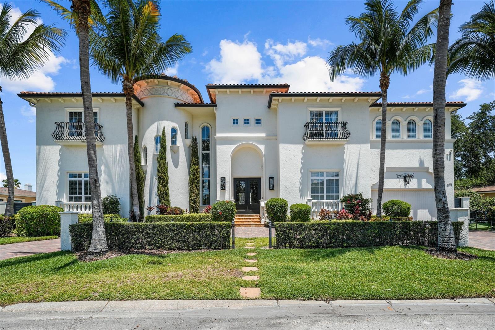 ..WILL SHOW TO QUALIFIED BUYERS. THIS IS AT SELLERS REQUEST. Discover the luxury of waterfront living in this better than new magnificent European Inspired
Masterpiece with contemporary flair. Featured in Home and Design Magazine, this state of the art
custom built home offers an open floor plan with an impressive two story foyer, 5BR plus 5 ½ baths plus
a stunning private office plus an incredible media room , ten foot ceilings up and down and a great room
open to a chef’s kitchen with two islands and Wolf, Bosch, and Subzero appliances seldom seen in
residential homes. The outdoor area is perfect for family gatherings or elegant entertaining with its
newly redone pool, spa, outdoor kitchen, covered porch, play area, and dock with a 13,000 lb boat lift and deck
with glass panel walls and new 113 foot seawall on the protected saltwater canal leading to Tampa Bay.
All this and you are minutes to Tampa’s top public &amp; private schools, world class shopping, sports arenas
for Super Bowl Champions, Michelin star restaurants, downtown &amp; Westshore Business District, short
Uber ride to Tampa International Airport, &amp; world class beaches. You can have it all!