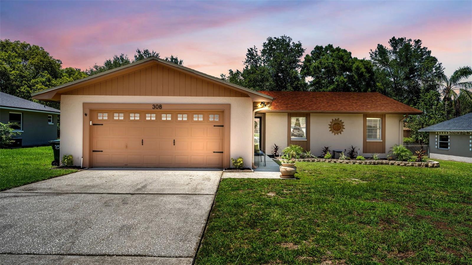 Move-in ready and thoughtfully updated, this well-maintained 4-bedroom, 2-bath home offers modern style, major system upgrades, all on a spacious, nearly quarter-acre fenced lot in the heart of Lakeland.

Designed for both everyday living and entertaining, the open-concept floor plan features wood-look ceramic tile throughout the main living areas, plush carpet in the bedrooms, and a beautifully updated kitchen with granite countertops, light cabinetry, a center island with breakfast bar, and newer appliances. The spacious primary suite offers a large walk-in closet and a renovated ensuite bath, while the additional bedrooms provide flexibility for family, guests, or a home office.

Step outside to the oversized screened lanai overlooking the private backyard, an ideal space for morning coffee, weekend gatherings, or simply unwinding at the end of the day.

Enjoy added peace of mind with a new A/C (2025), new sewer line (2024), and a roof replaced in 2019, providing confidence that many of the home's major systems have already been updated.

Conveniently located just minutes from shopping, dining, medical facilities, parks, schools, and major commuter routes, this home offers the perfect blend of comfort, functionality, and location. With the major updates already completed, all that's left to do is move in and make it your own—with no HOA to worry about.