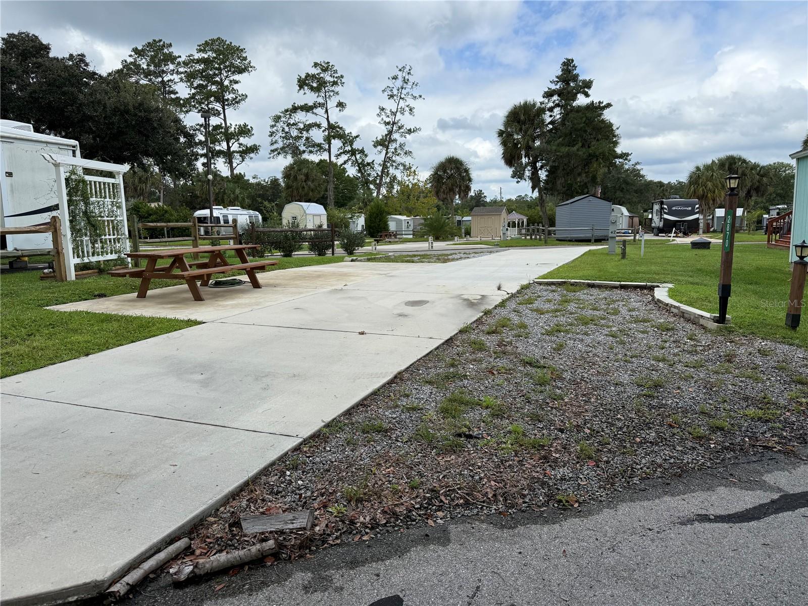 VILLAGE PARK AT THE WILDERNESS RV PARK ESTATES - Land