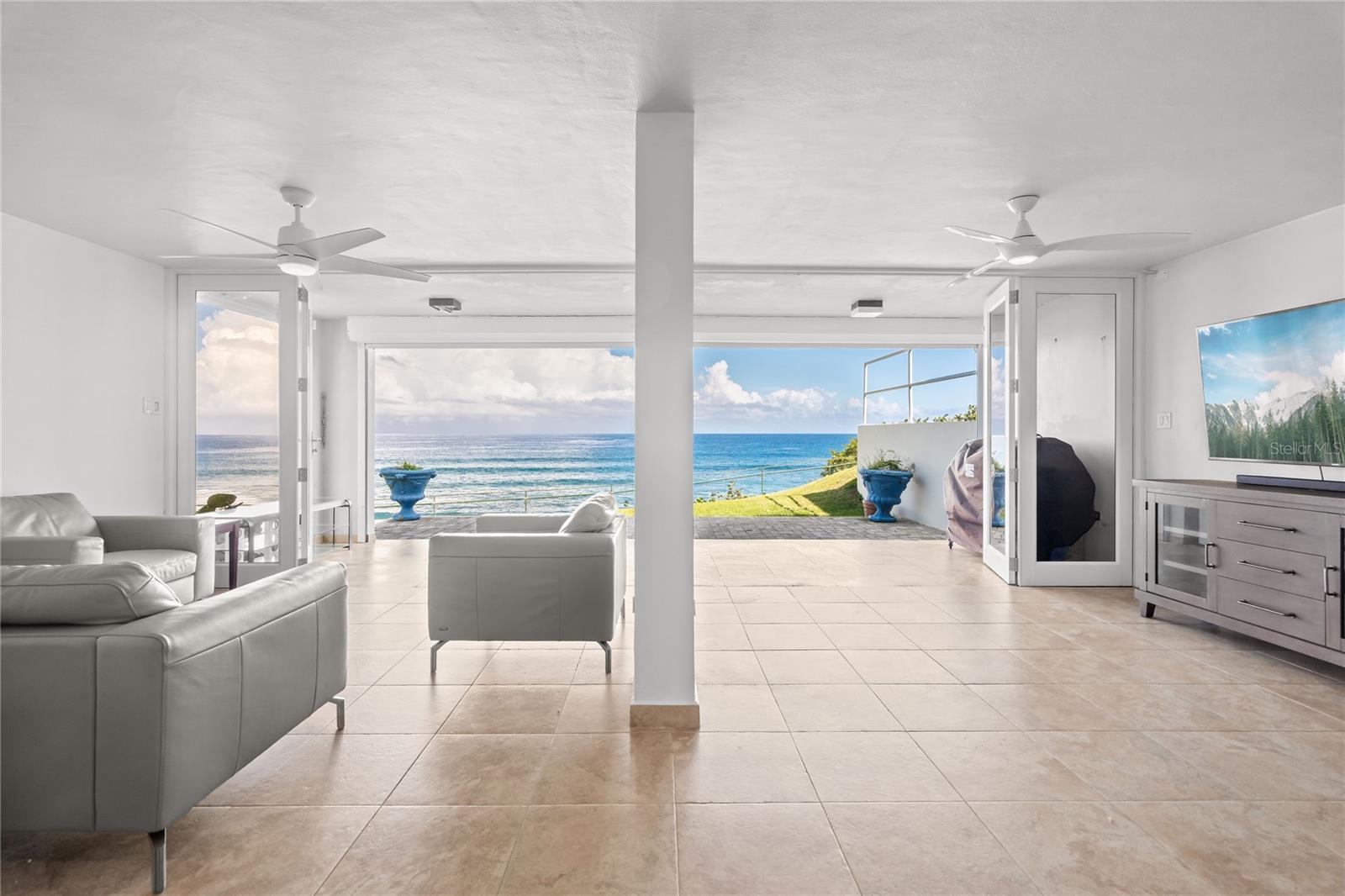 Experience coastal living at its finest in this stunning 3-bedroom, 2.5-bathroom residence located in an exclusive, 24-hour gated community. Designed to maximize natural light and refreshing ocean cross-breezes, the bright, open-concept layout seamlessly connects the living and dining areas to a modern-remodeled kitchen fully equipped with contemporary appliances. Front-row ocean views and enjoy direct beach access just steps away. This refined retreat offers the perfect balance of privacy and comfort, complete with premium resort-style community amenities including a clubhouse, golf course, playground, and dog park.  It has 2 assigned parking spaces and also visit parkings available.
