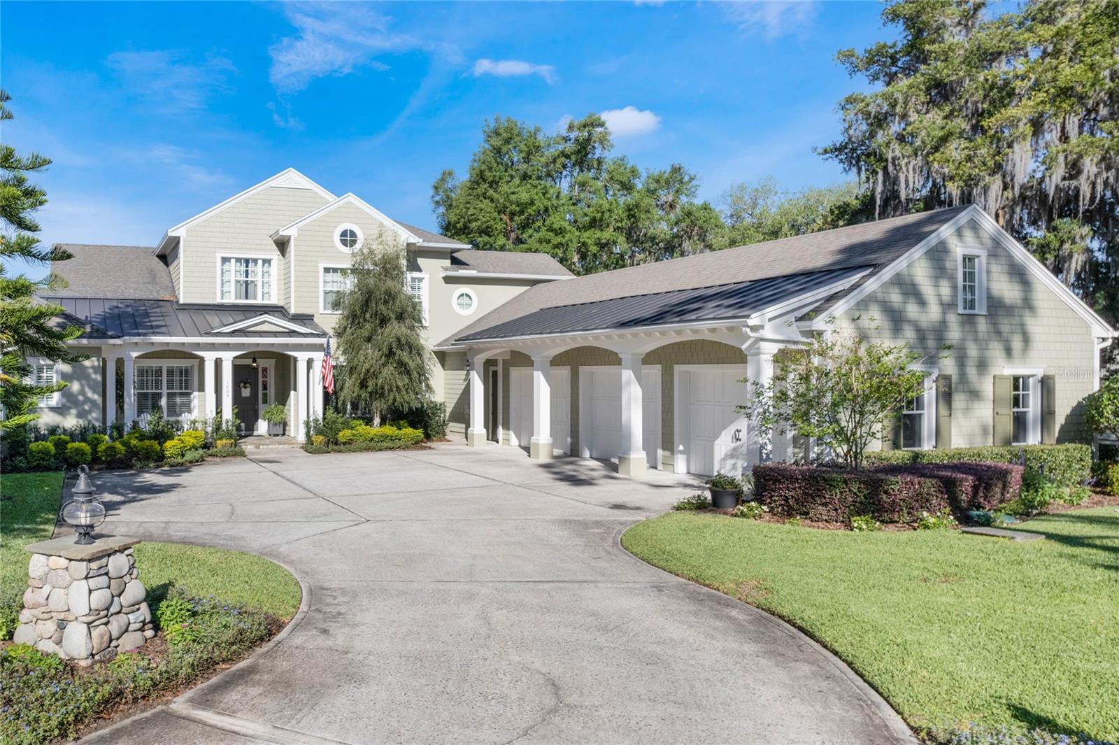 Amazing custom build with a spacious yard and beautiful lake views.  This home offers all of the custom upgrades from central vacuum, crown molding, timeless tiled baths and an expansive back covered back porch.  The home offers 5 bedrooms and 5 baths. From the second you enter the spacious foyer your eyes float over the dining room to the bank of french doors over looking the pool and lake. There is a formal living room as you enter the home perfect for those small quiet conversations with friends and neighbors.  The master bedroom is on the first floor and over looks the pool and lake.  The master bathroom over flows with storage, a private water closet, beautiful stand alone tub and and walk in shower.  There is another bedroom, currently used for an office, and bath on this side of the home.  The wood floors flow throughout the main living area.  The kitchen is bright and light with an island, bar area with seating and an eat in nook area.  Storage for paperwork is conveniently located at your built in desk.  The family room is right off the kitchen and boasts a beautiful rock and wood planked fireplace.  Off the back wing is a 3rd area for a playroom, in law suite, study room or music room.  Great Flex space!!  Upstairs you will find a loft, 3 bedrooms and 2 baths.  The pool has a spa and the home will have a brand new roof.  The back porch and exterior dining, living and outdoor kitchen are spacious and well covered.   The pool is also a custom build.