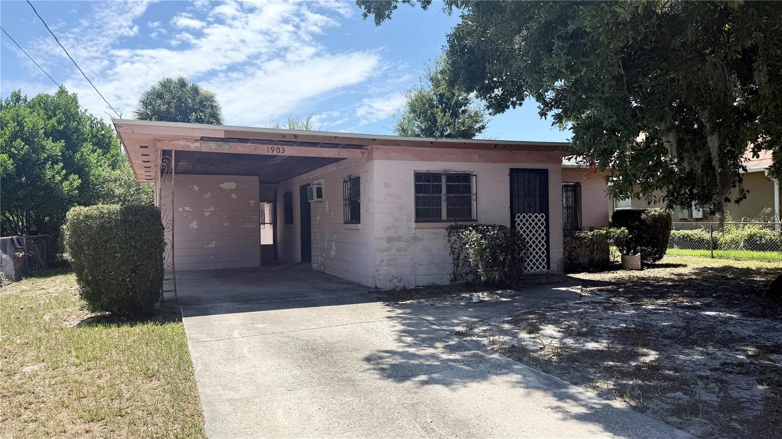 Investor Alert! This solid 3-bedroom, 1-bathroom block home sits on a spacious lot in an established neighborhood with NO HOA. Fully fenced from front to back, the property offers a massive backyard and a generous front yard, complete with a charming enclosed front porch. Capitalize on excellent bones and recent big-ticket upgrade-brand-new roof installed in 2025. While the interior needs some cosmetic updating, it represents the ideal canvas for a savvy investor looking for a high-yield rental or a flip project. Enjoy a prime location just minutes from a local lake, park, community recreation center, sought-after magnet schools, and convenient public transit. Opportunities like this don't last long, so bring your vision and make an offer before it’s too late!