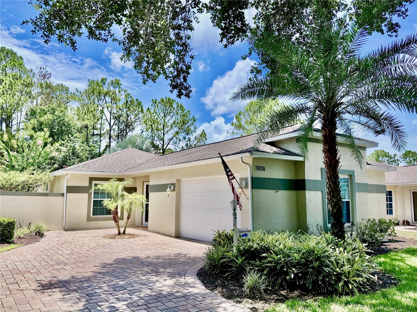 Virtually Staged. Enjoy the low-maintenance lifestyle you’ve been waiting for in one of Kings Ridge’s most sought-after floor plans, perfectly positioned with peaceful wooded and golf course views.

Welcome to the popular Cottage Series York model, enhanced with a fully enclosed Florida Garden Room under central HVAC, creating additional year-round living space ideal for relaxing, hobbies, reading, or a home office while overlooking the landscaped backyard.

One of this home’s standout features is its generous fenced side yard with a private side patio, rear patio, and attractive fencing overlooking the wooded golf course. This inviting outdoor space offers exceptional privacy and room to relax or entertain.

Peace of mind comes with major updates already completed, including a new 16-Seer HVAC (2020) and water heater (2021), allowing you to enjoy the Kings Ridge lifestyle with fewer maintenance concerns.

Inside, the split-bedroom floor plan provides privacy for homeowners and guests, while the spacious living and dining areas are filled with natural light.

The updated kitchen features quartz countertops, a contemporary glass-tile backsplash, Samsung stainless-steel appliances, and a built-in planning desk with a matching quartz countertop and glass-front upper cabinets for added style and storage.

Easy-care tile flooring extends throughout the home with no carpet. Ceiling fans in both bedrooms, the living room, and the Florida Garden Room provide year-round comfort.

The private primary suite overlooks the patio and wooded golf course through two large windows. The ensuite bath has been updated with a newer granite vanity and renovated walk-in shower. The guest bedroom is privately located on the opposite side of the home beside the updated second full bath with a granite vanity and tub/shower combination.

Beyond the home, Kings Ridge is one of Central Florida’s premier 55+ active adult communities, featuring clubhouses, heated pools and spas, tennis, pickleball, fitness facilities, social clubs, hobby groups, and year-round activities. Golf cart-friendly streets provide convenient access throughout the community and to nearby shopping, restaurants, grocery stores, banking, and medical offices.

For golf enthusiasts, Kings Ridge also offers two public golf courses with optional memberships. Whether you play or simply enjoy the scenery, this home’s wooded golf course setting provides a beautiful backdrop with no direct rear neighbors.

The monthly maintenance fee includes lawn care with front shrub trimming, irrigation system maintenance and irrigation water, Spectrum internet and cable TV, private road maintenance, and exterior painting of the home. Combined with the recent mechanical updates, this home offers the carefree lifestyle that has made Kings Ridge one of Clermont’s most desirable active adult communities.

If you’ve been searching for a move-in-ready home with private outdoor living, tasteful updates, peaceful golf course surroundings, and an active, low-maintenance community, this exceptional York model is ready to welcome you home.