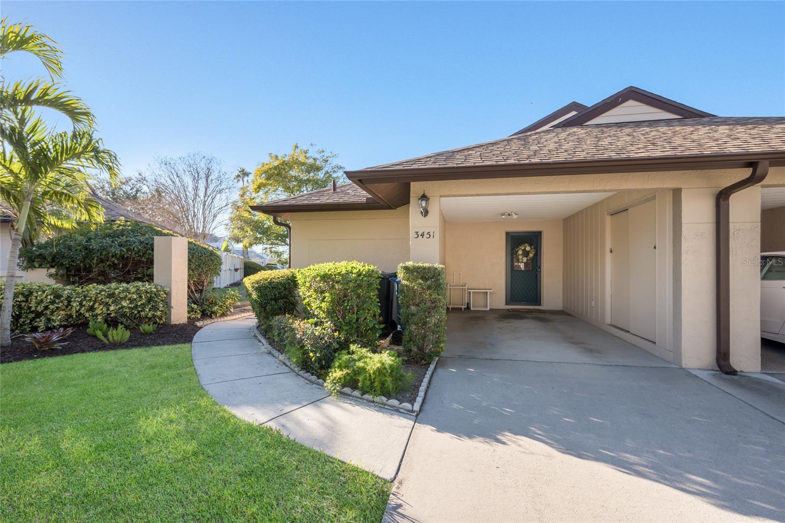 Welcome to easy Florida living in this charming single story, duplex-style condo in Bradenton! This 2-bedroom, 2-bath home offers a smart, split floor plan layout with an enclosed porch—perfect for morning coffee or relaxing evenings. You’ll love the convenience of covered parking under your attached carport, plus extra outdoor storage for beach gear. Major updates are already done for you, with a new roof in 2021 and HVAC replaced in 2023. Located just 15 minutes from Bradenton Beach—yet not in a flood zone, so no flood insurance required—you get peace of mind along with the coastal lifestyle. You're also just a 4-minute drive to Detwiler's Farm Market, 6-minute drive to IMG Academy & 8-minute drive to G.T. Bray Park! The location can't get any better! All of that in addition to being able to enjoy the community pool, tennis courts & hot tub without the upkeep?! It's time to embrace truly low-maintenance living in the perfect Bradenton location!