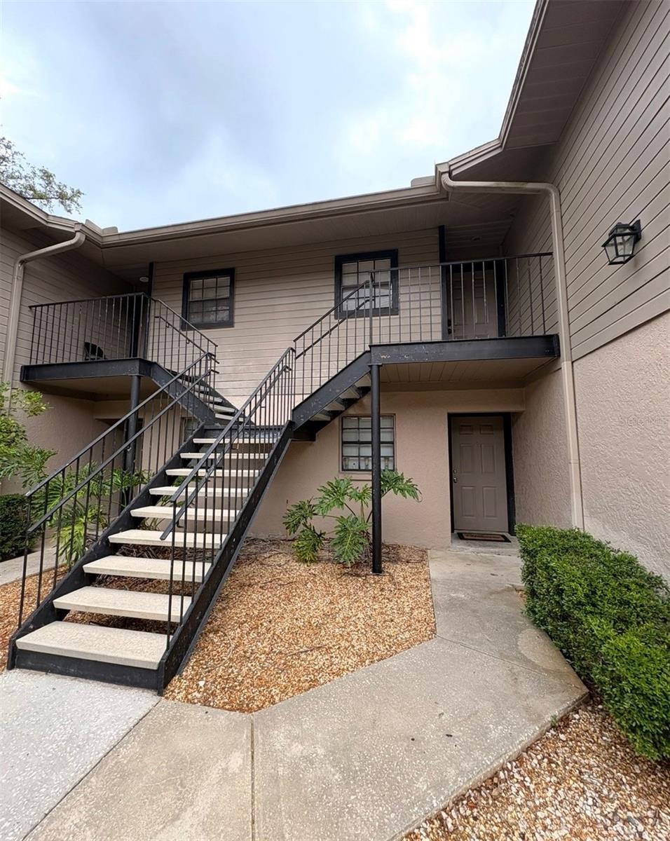 Welcome to this beautifully maintained, completely renovated second-floor condo located near the University of South Florida. This move-in ready home offers a split-bedroom layout, upgraded kitchen and baths, a screened patio, and modern systems for ultimate convenience and peace of mind.