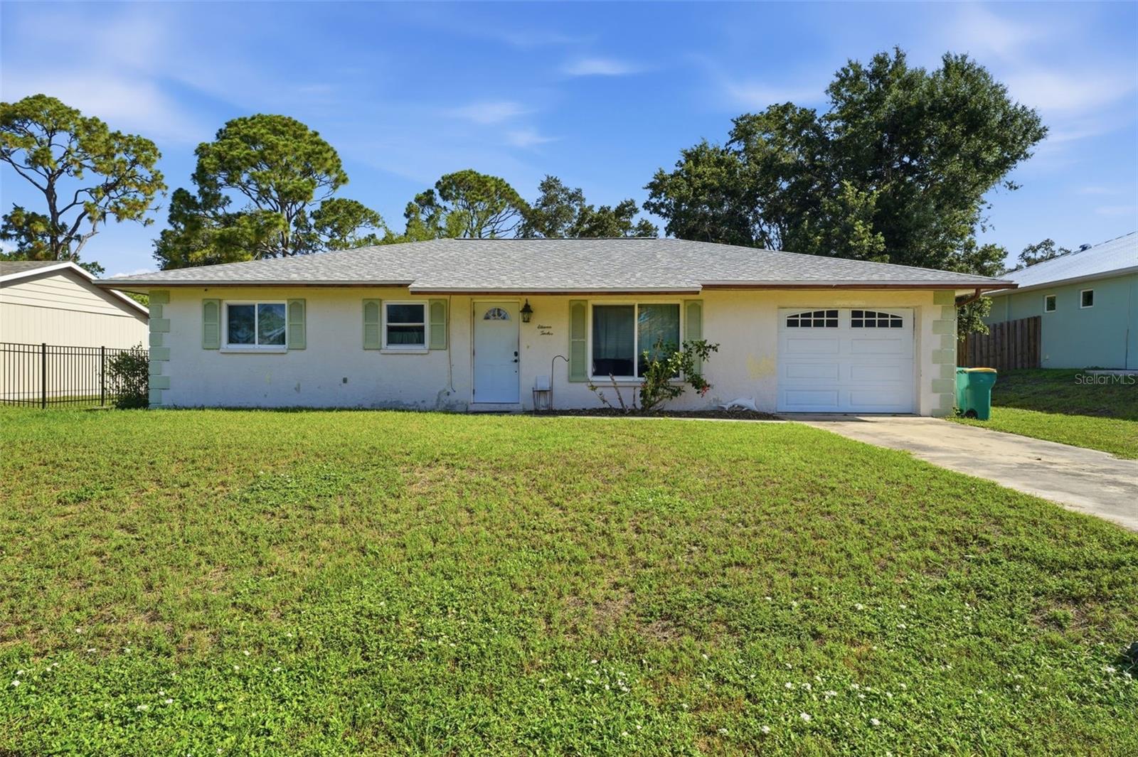 Under contract-accepting backup offers. OPPORTUNITY AWAITS!! This 2-bedroom, 2 bath home offers great potential for buyers looking to make it their own or an investor to add to their portfolio. 
Featuring an oversized one-car garage, a large screened in lanai and a private backyard. This property is located in a quiet, established neighborhood in a convenient location close to shopping, dining, and everday amenities. The home needs updating and repairs making it an excellent investment or renovation project. Priced accordingly to reflect its condition and ready for your vision to bring back to life. 

The following are updates the owner has made and is recorded on Charlotte County public permitting records. 
Roof replaced in 2025, All impact windows-2019, Impact garage door- 2018, AC 2017, and Lift station for septic system- 2016. 
Entire Septic system replaced in 2016, including tank, drain fields, and lift station according to owner. Buyer can verify at Charlotte County Health Department.
