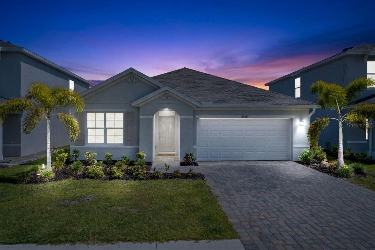 Welcome to Coral Bay! This beautifully designed 2025-built Aria model offers 3 bedrooms, 2 bathrooms, and 1,672 sq ft of thoughtfully designed living space with serene lake views. The open-concept floor plan features a spacious kitchen with solid surface countertops, stainless steel appliances, shaker-style cabinetry, and a large center island perfect for entertaining. Enjoy tile flooring throughout main living areas, smart home technology, and a generous primary suite with dual vanities, walk-in shower, and oversized linen closet. Located in the gated Coral Bay community with resort-style amenities including clubhouse, fitness center, pool, pickleball, bocce, and playground. Conveniently situated near I-75, downtown Fort Myers, shopping, dining, boating, and medical facilities. This move-in-ready home offers the perfect blend of comfort, convenience, and lifestyle, whether you're looking for a primary residence, seasonal retreat, or investment opportunity. Plus, the remaining builder's warranty is transferable to the new owner for added peace of mind.