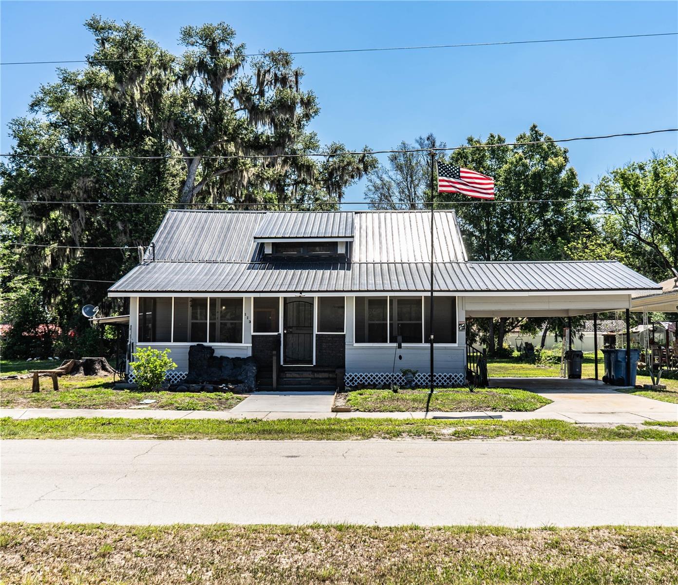 Price decrease!   Love country living with city convenience? This beautifully remodeled historic bungalow offers the best of both worlds! Situated on an oversized 1/4+ acre lot in a great neighborhood, this move-in-ready home was extensively updated in 2022/2023 and is packed with value.
Features include a newer metal roof (2022), impact windows, newer vinyl flooring (2023), updated finishes, and a spacious screened porch perfect for morning coffee, relaxing evenings, and enjoying peaceful outdoor views year-round.
No HOA. No CDD. No flood zone.
Bring your RVs, trucks, boats, and toys — there’s plenty of room for it all. Surrounded by newer construction and renovated homes, this property offers privacy, charm, and future value potential while still being just minutes from shopping, dining, and nearby towns.
Perfect for first-time buyers, downsizers, or anyone seeking low-maintenance living with space to spread out. Schedule your private showing today!