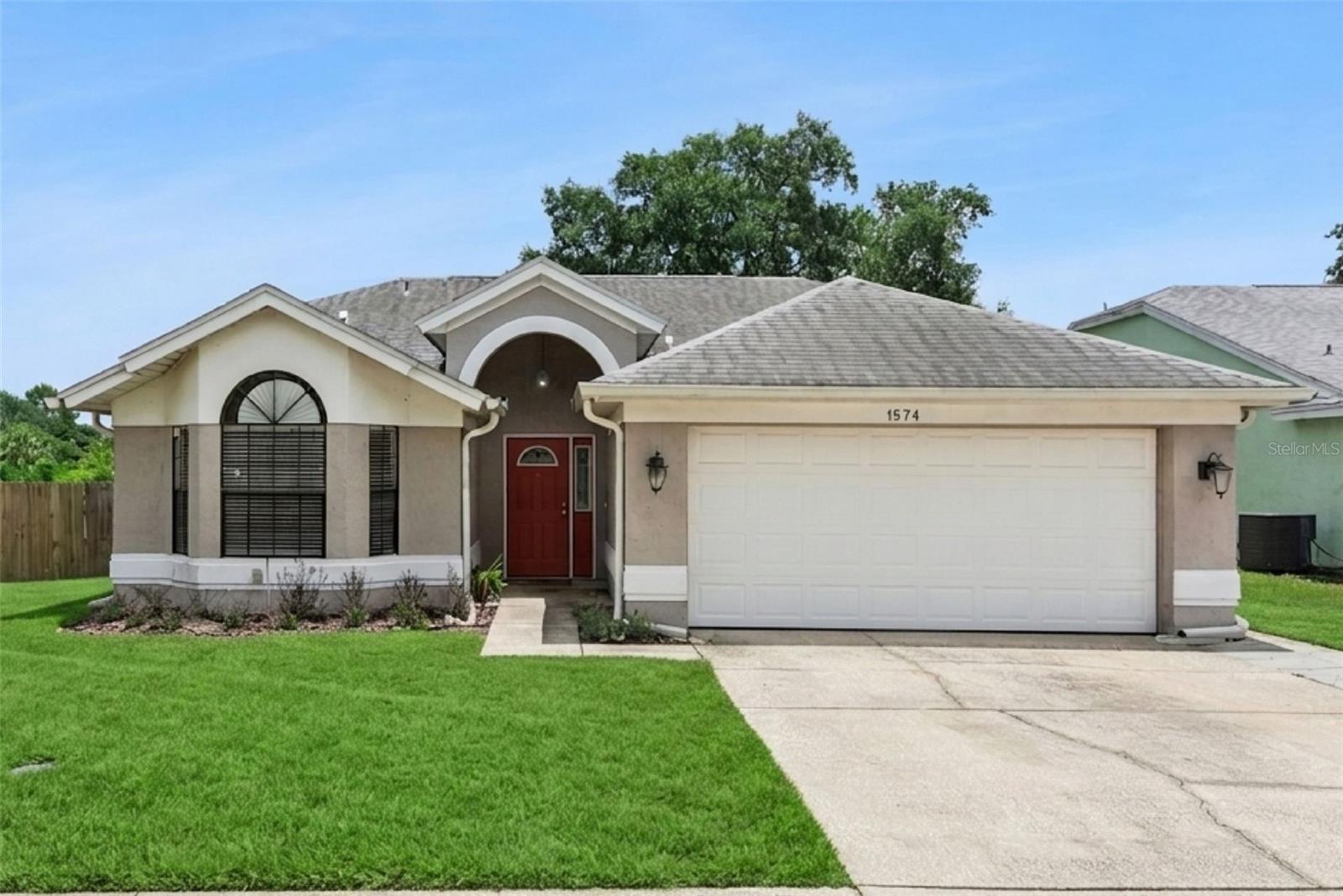 Welcome home to this charming 3-bedroom, 2-bathroom home with a 2-car garage, nestled on a corner lot in a quiet Apopka neighborhood. Enjoy Florida living with a spacious screened-in porch overlooking a fully fenced backyard, perfect for entertaining, pets, or simply relaxing outdoors.

Inside, the open-concept floor plan features tile flooring throughout the main living areas, a well-appointed kitchen with granite countertops, stainless steel appliances, and plenty of space for gathering. Both bathrooms also feature granite countertops for a cohesive, updated look.

The spacious primary suite offers wood-look laminate flooring, a large walk-in closet, a garden tub with shower, and a private water closet. The third bedroom features a beautiful bay window, making it an ideal guest room, nursery, or home office.

Recent updates provide added value and peace of mind, including a newer HVAC system (2024), water heater (2025), complete home repipe (2026), and popcorn ceiling removal, and custom closet systems.

With low HOA fees and a convenient location just minutes from Highways 429, 451, 441, and 436, you'll enjoy easy access to shopping, dining, and everyday conveniences. Downtown Orlando and Universal Orlando Resort are approximately 20 minutes away, while Walt Disney World Resort is about 30 minutes away, offering the perfect balance of peaceful neighborhood living and quick access to Central Florida's top destinations.