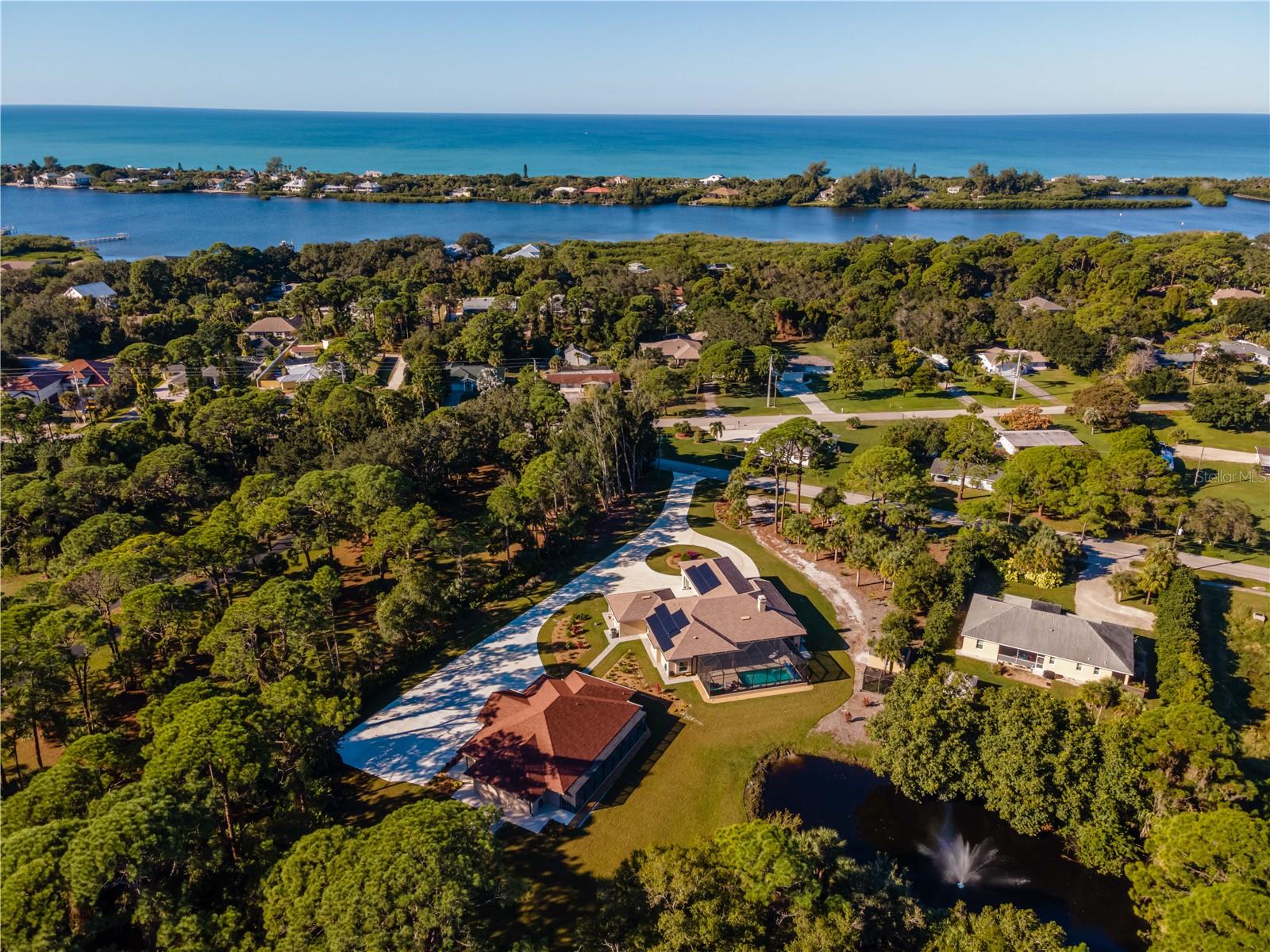 Exceptional turnkey hospitality, retreat, and mixed-use investment opportunity located less than one mile from Manasota Beach on 4.46 private acres in South Venice/Northern Englewood. Historical hospitality operations, turnkey, furnishings, premium equipment, established infrastructure, and seller financing opportunities for qualified buyers create a rare opportunity for an owner operator, investor or entrepreneur seeking a unique coastal asset.
Built in 2021 to Category 5 storm standards, this unique property combines luxury accommodations, operational infrastructure, and future growth potential in one remarkable offering.
The property consists of a private owner’s residence and a separate guest lodge with a combined 9 bedrooms and 7 bathrooms, totaling more than 7,000 square feet. The guest lodge features five private ensuite guest rooms, gathering space, and hospitality-oriented amenities that have supported successful boutique lodging operations. The property is currently utilized as both a private residence and hospitality business.
Designed for efficiency and guest comfort, the estate includes extensive parking for 15+ vehicles, a private lift station, solar energy infrastructure with exceptionally low utility costs, a heated saltwater pool, multiple outdoor entertainment areas, and professionally landscaped grounds with pond and pergola features.
The mixed-use designation provides exceptional flexibility for a variety of potential uses, including boutique hospitality, executive retreats, wellness retreats, event-based operations, private compounds, and other approved uses subject to applicable regulations and approvals.
Offered fully furnished and turnkey, this is a rare opportunity to acquire a luxury property with proven hospitality appeal, substantial infrastructure investment, and significant future potential in one of Southwest Florida’s most desirable coastal locations.