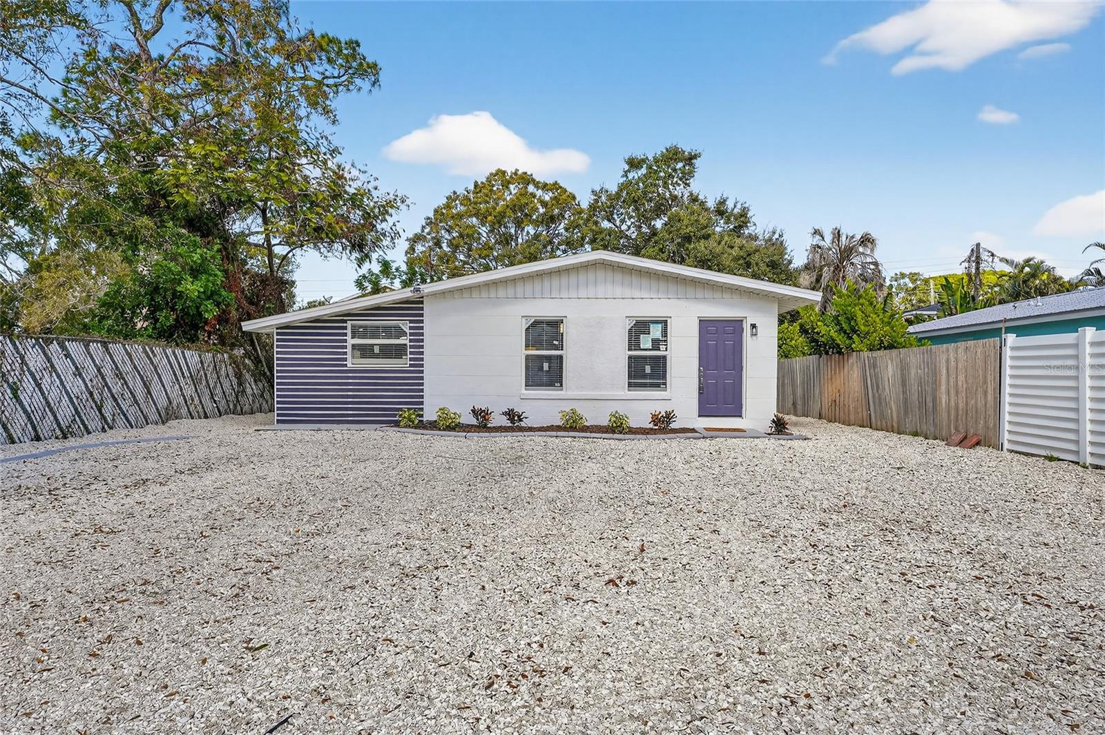 New Price improvement!! Step into this fully remodeled, move-in ready home in the heart of Sarasota! This beautifully updated property features modern finishes throughout,  including a new kitchen with contemporary cabinetry, quartz countertops and stainless steel appliances. Renovated bathroom, updated tile flooring, lighting, and fresh interior and exterior paint. Brand new hurricane impact windows and doors, a 2021 architectural shingle roof, 2024 Water heater and updated plumbing, 2017 HVAC fully serviced. The open and functional layout offers excellent natural light and comfortable living spaces, ideal for both full-time residents and investors. Recent upgrades provide peace of mind and low maintenance for years to come. Ample parking space and a large fenced in backyard. Located just minutes from downtown Sarasota, Siesta Key Beach, shopping, dining, and top-rated schools. The property is situated in an area known for strong rental demand and may be suitable for short-term rental use, making it an attractive opportunity for Airbnb or vacation rental income (buyer to verify all local regulations). No HOA. No Flood zone. Prime location. Turnkey condition. A rare opportunity to own a fully renovated home in one of Sarasota’s most desirable areas.