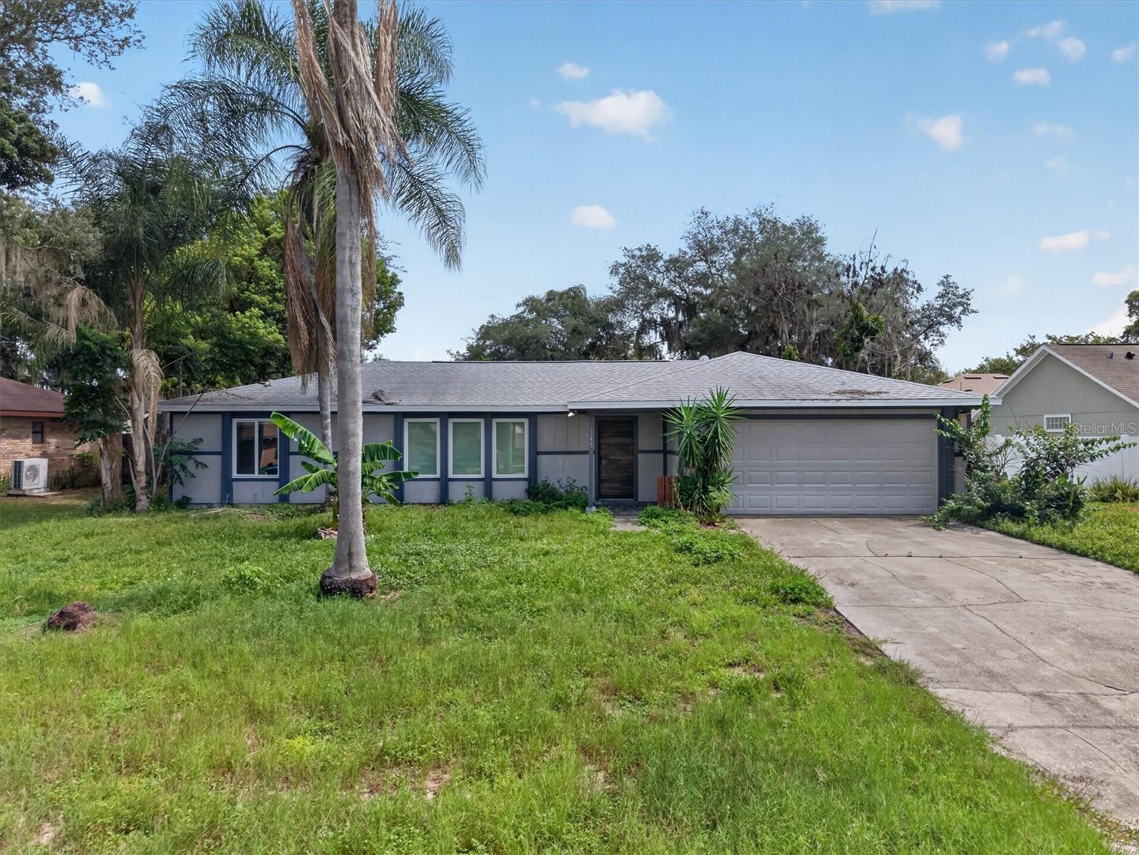 Bring your vision to 1345 Herndon Ave in Deltona. This property offers a great opportunity for a buyer willing to make updates and repairs while enjoying the added bonus of a screened-in pool. Whether you are looking for a primary residence, investment property, or renovation project, this home has potential for the right buyer. The screened pool area adds outdoor living space and is a great space for entertaining. Conveniently located in Deltona, this home is ready for someone to bring it back to life and make it their own. Property is being sold as-is. NEW ROOF 2021 NEW A/C and Duct work 2021, NEW WINDOWS 2023 POOL PUMP 2022.  This 5 bedroom, 3 bathroom house is a great opportunity to live in a HOA free neighborhood. Peaceful backyard with screened in pool. Pool needs a new liner  Easy drive to the beaches and I-4.